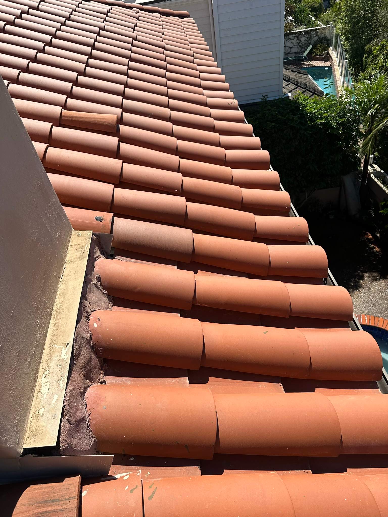Orange County Clay Tile Roof Soft Wash on Unwalkwable Roof by Property Cleaning Experts