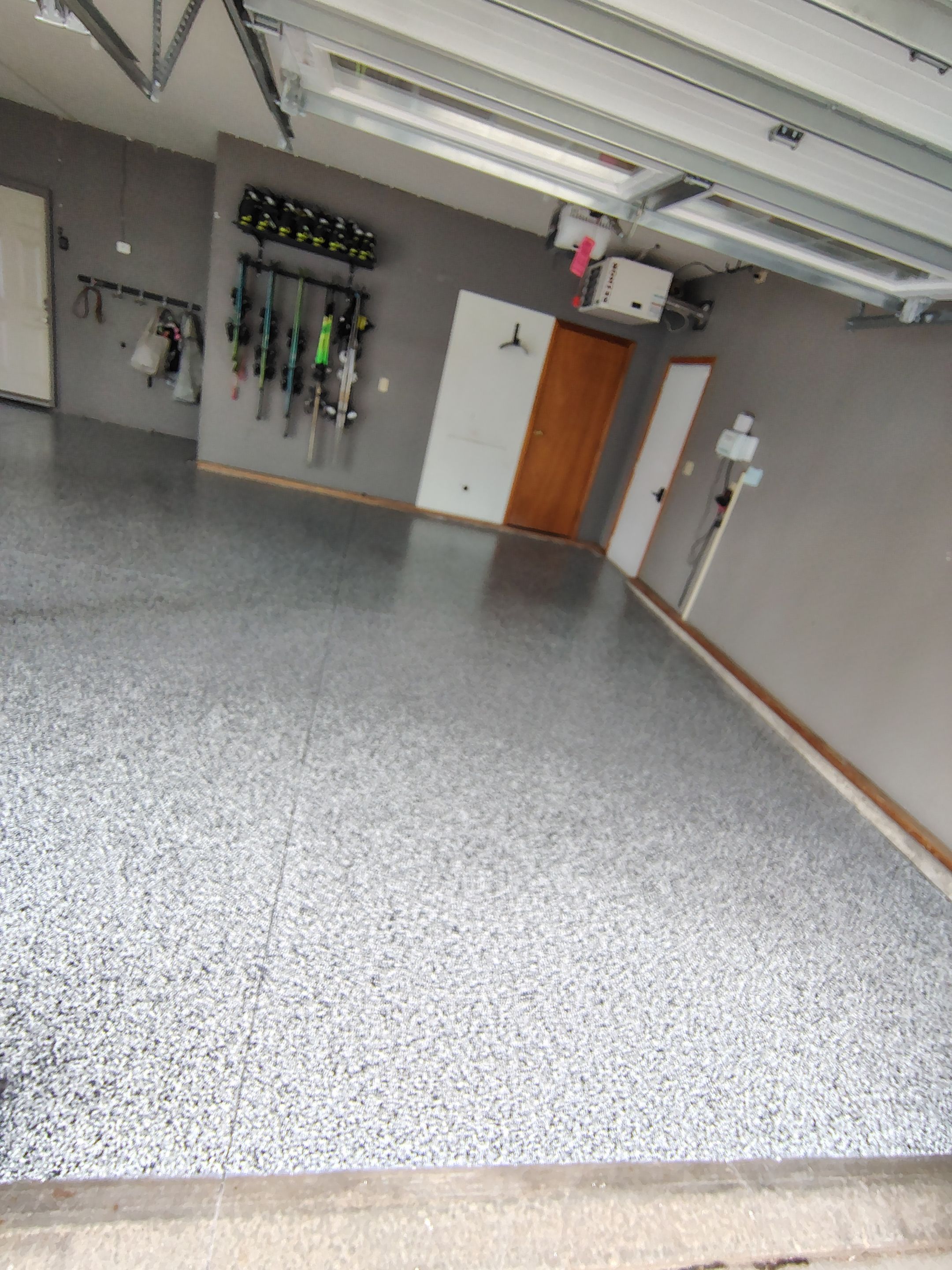 Garage Floor Concrete Coating and Crack Repair in Sioux Falls by Select Painting, Coatings & Garage Cabinets