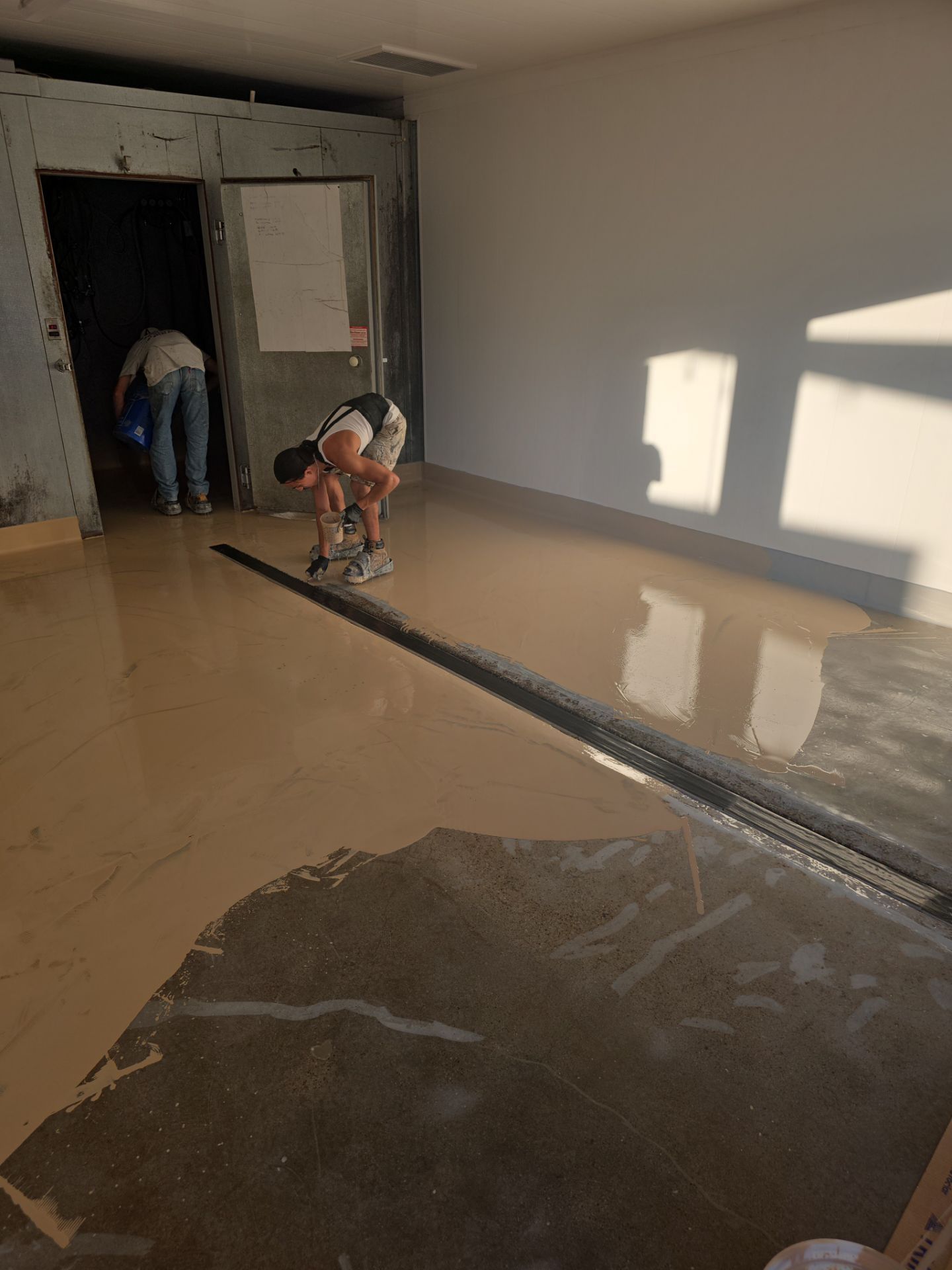 Industrial Red Quartz Polyurea Floor Installation for Atascadero Brewery by MGP Coatings