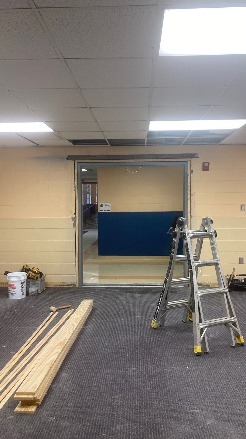 Wall Repair and Door Installation by Dodson House Moving