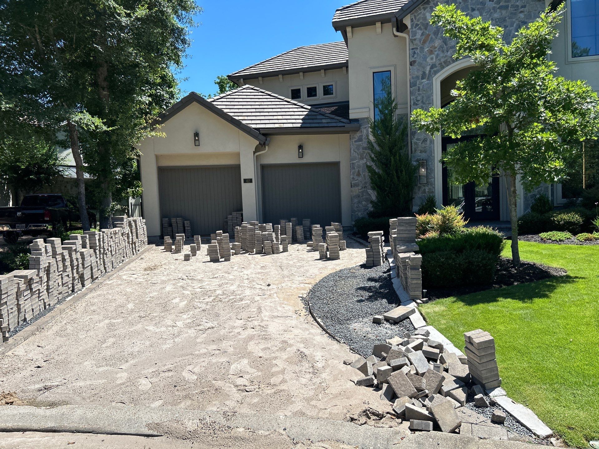 🚧 Mr. Barnes’ Driveway Makeover – Built the Right Way When Mr. Barnes reached out, his paver driveway was sinking and shifting—just two years after the house was built. The root cause? The builder skipped a stable base and didn’t plan for downspout drainage under the driveway. Without proper support, water had been slowly washing away the foundation. That’s where Alejandro and the Texas Urban Team came in to make it right. 🔹 What We Did: ✅ Demolition – Removed the unstable foundation and failing sections of the driveway. ✅ Base Rebuild – Installed a new compacted limestone and granite foundation to give the pavers long-term strength. ✅ Downspout Drainage Integration – Ran a PVC line under the driveway to carry roof runoff away, protecting the base from erosion. ✅ Paver Reinstallation – Carefully laid new pavers using Keystone-certified methods for a precise, polished finish. ✅ Sealed & Finished – Added polymeric sand to lock pavers in place and keep weeds out. 💡 The result: a solid, level, and stormwater-protected driveway that enhances curb appeal while standing up to Houston’s heavy rains. by Texas Urban Elements