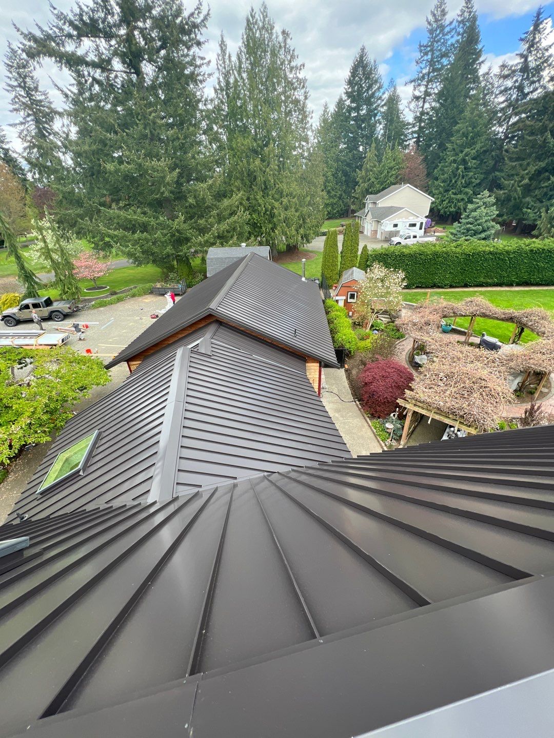 Buckley Roof Replacement using Standing Seam Metal - Dark Bronze by RoofSmart