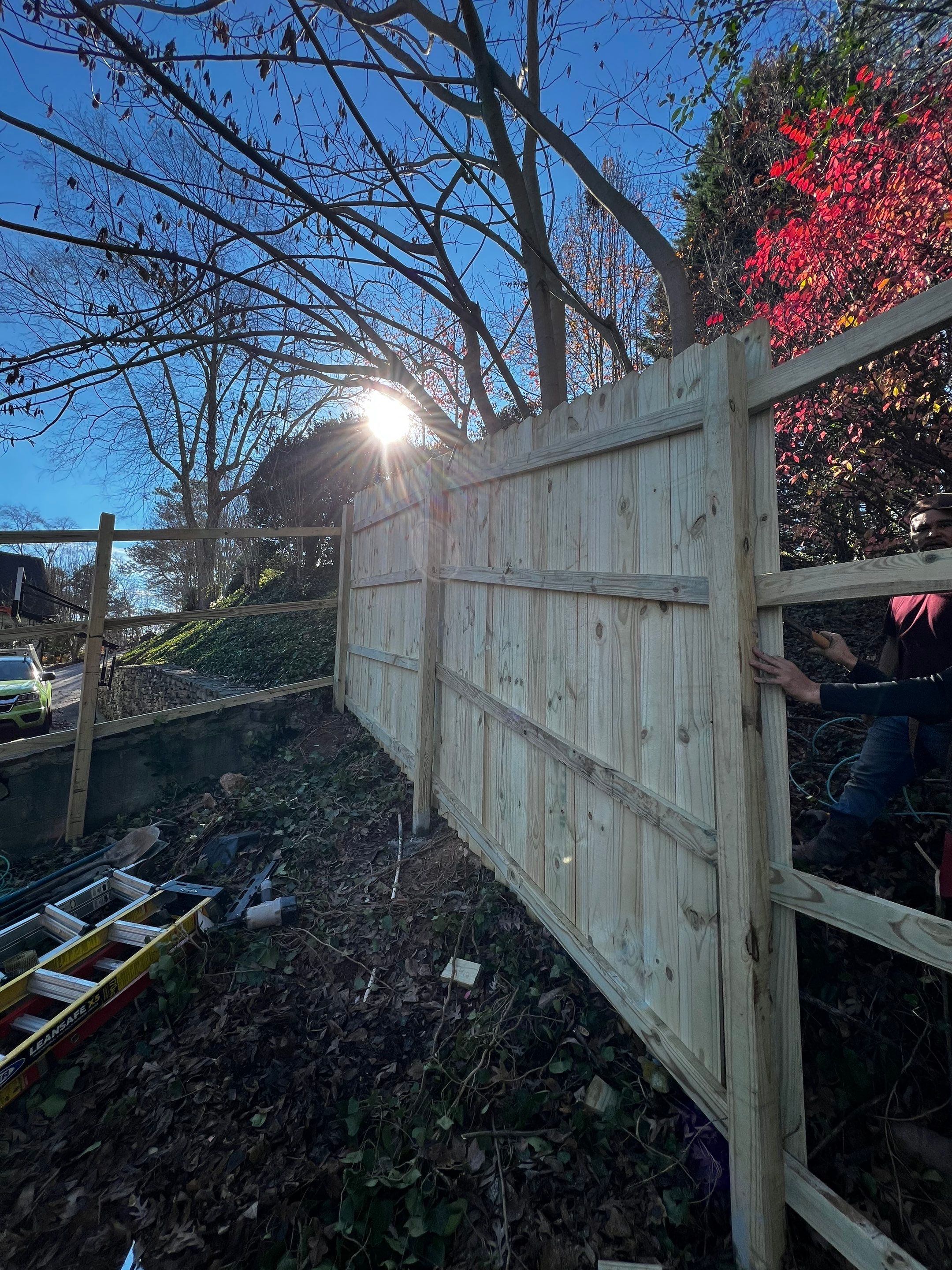 Wood Privacy Fence Installation and Multi-Level Deck Staining in Atlanta by Swift Home Renovations 