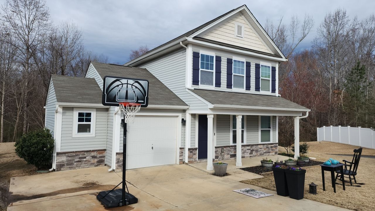 House Wash using cleaner by Power Wash Masters LLC
