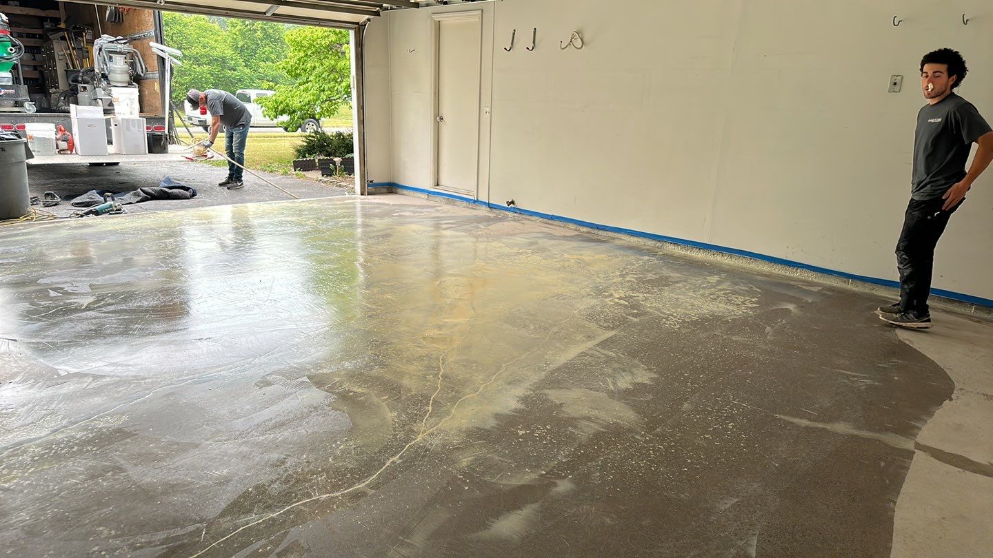 Silverado garage floor coating  by NG Masonry & Construction LLC