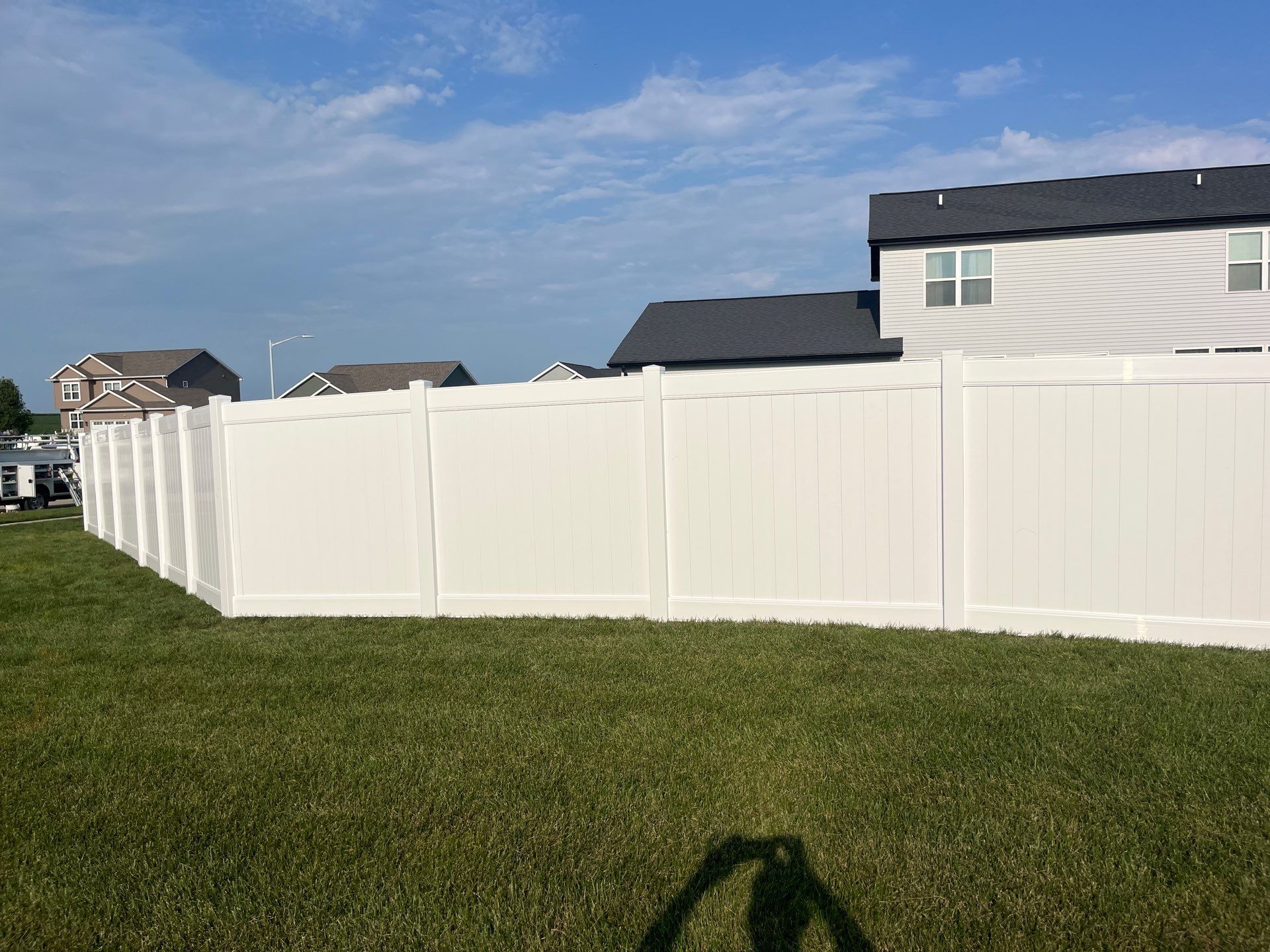 White Vinyl Privacy Fence Installation With Double Gates in Waterloo by Perfect Picket Fence and Stain