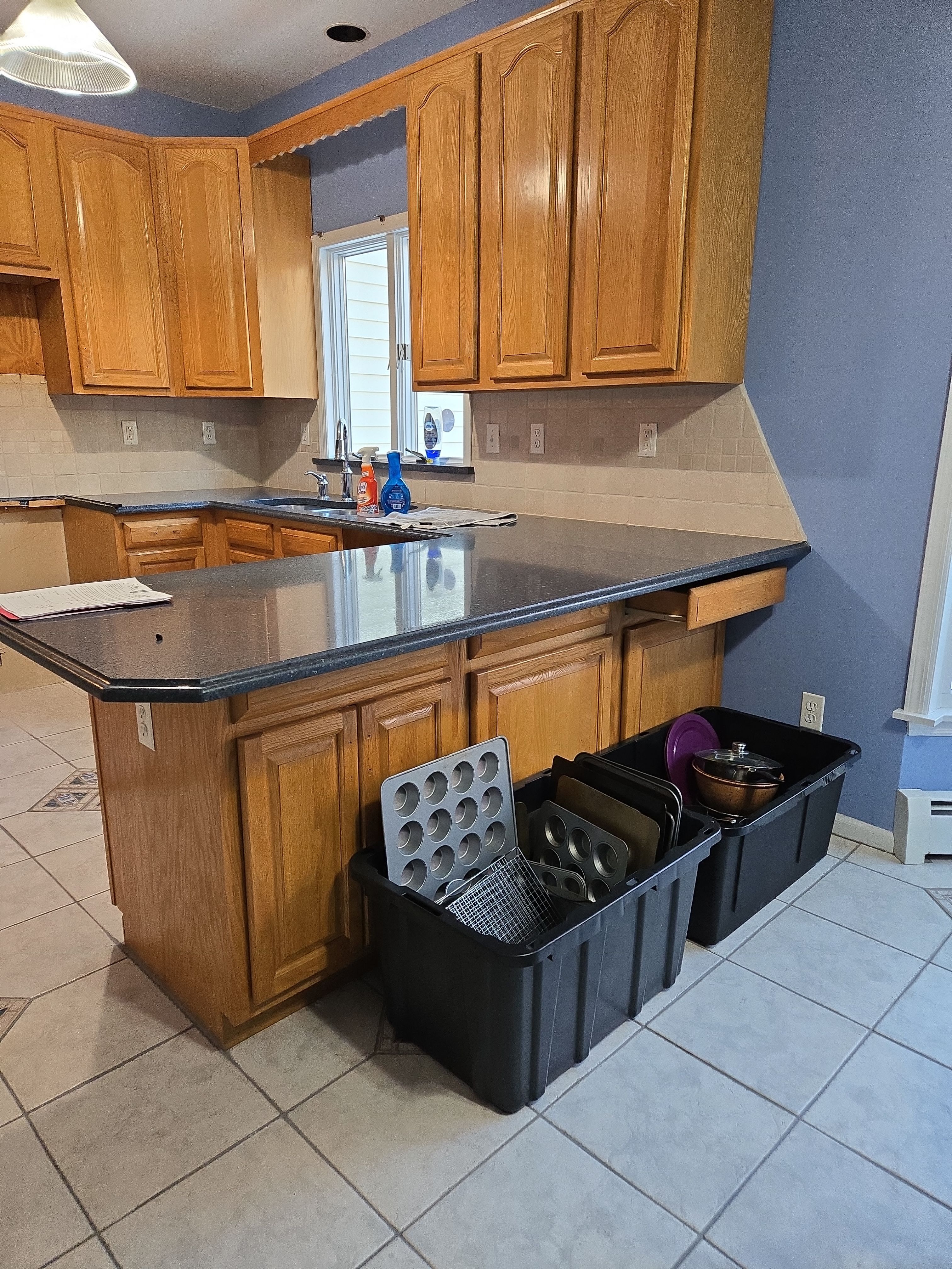 Cabinet Refinishing using Benjamin Moore Command by Spectrum Painting, LLC