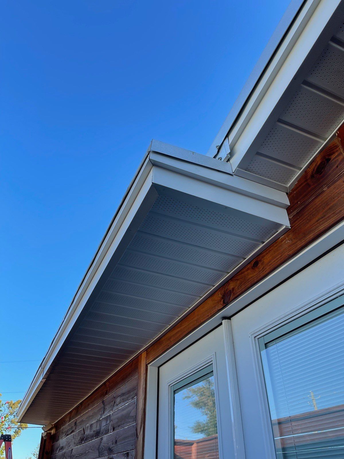 Gutter Installation using K-Style Seamless Gutters and Soffit and Fascia Replacement by Gutter Professors