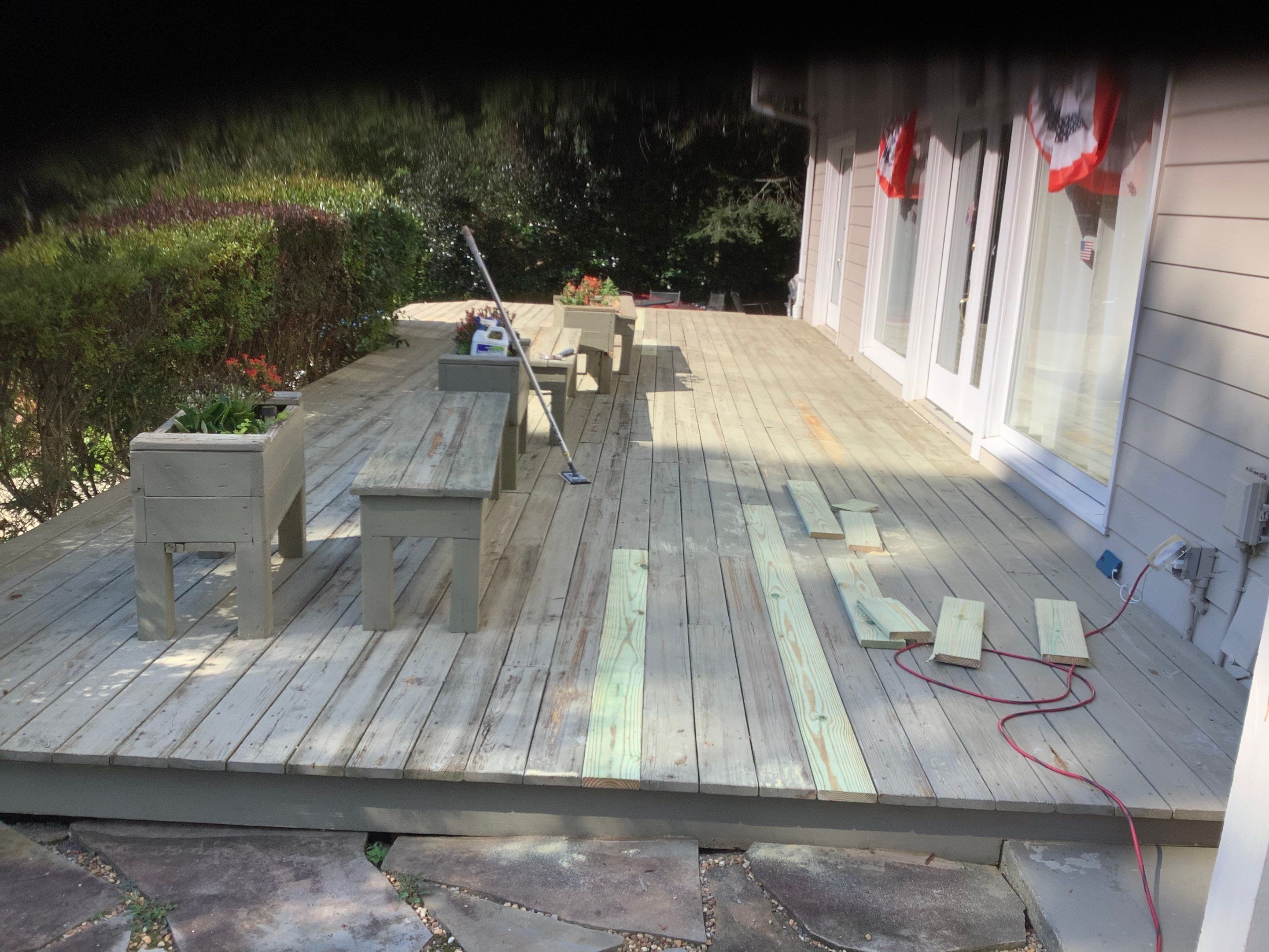 Roswell Deck Restoration Featuring Pressure-Treated Wood and Grey Finish by Swift Home Renovations 