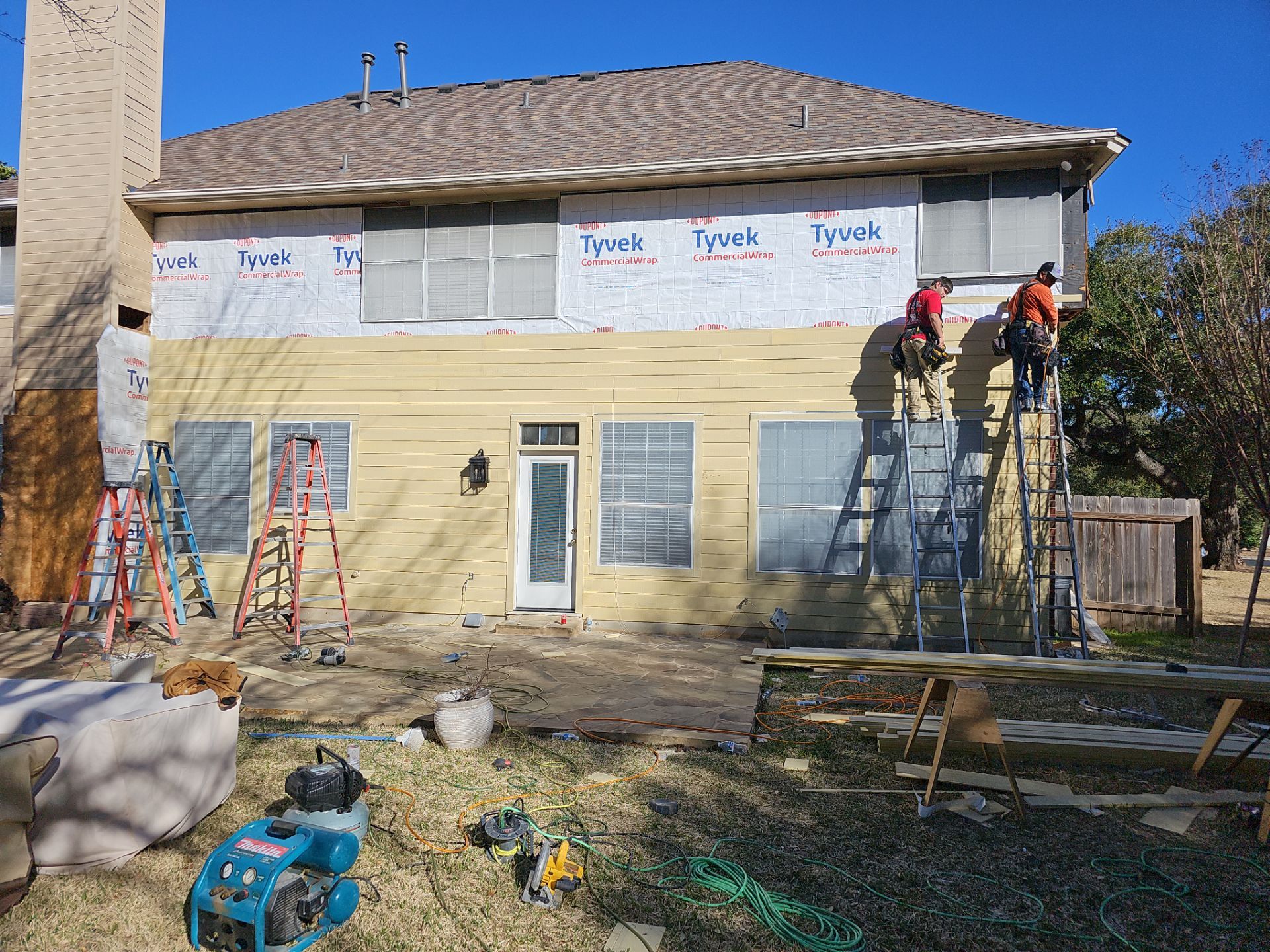 New Hardie Lap Siding & Board and Batten by DeZign Roofing & Exteriors