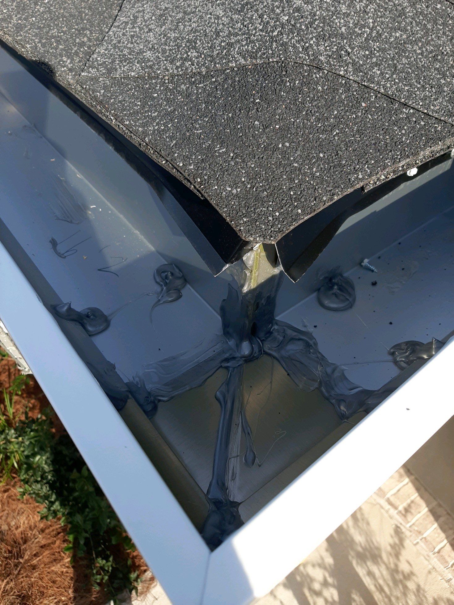 Seamless Gutter Installation Using White K-Style Gutters by Gutter Professors