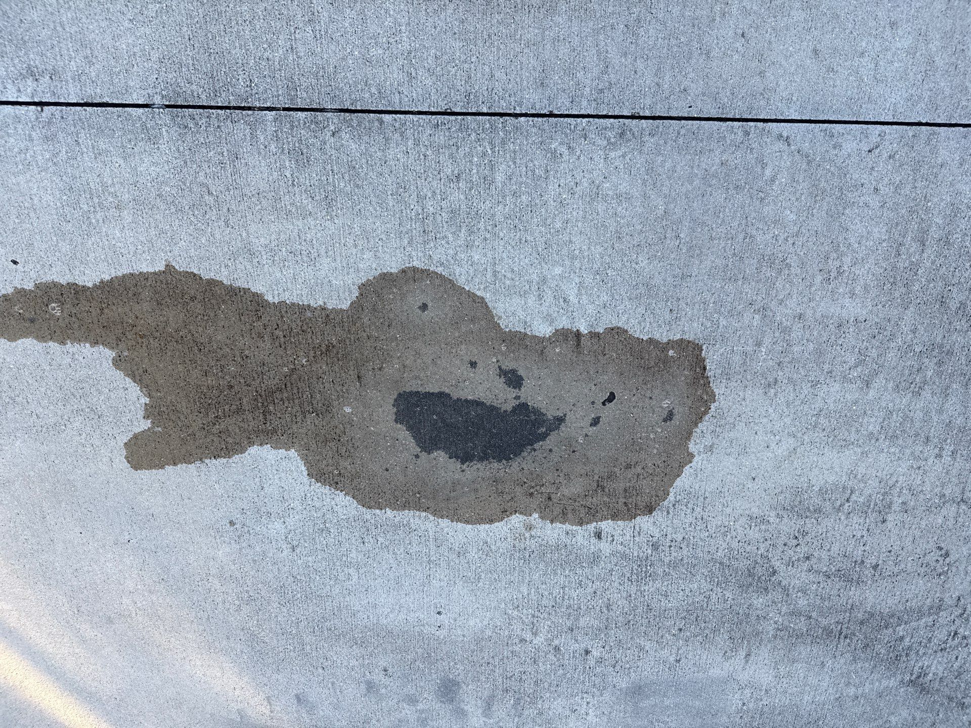 Oil Stain Removal & Concrete Cleaning – The Heights Community, Bradenton, FL by Sunshine AquaWash