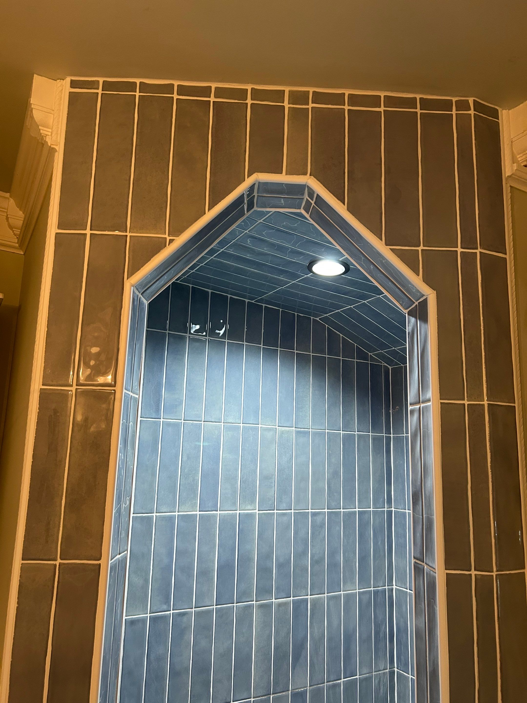 Tile shower and floor by Footprints Floors of Nashville