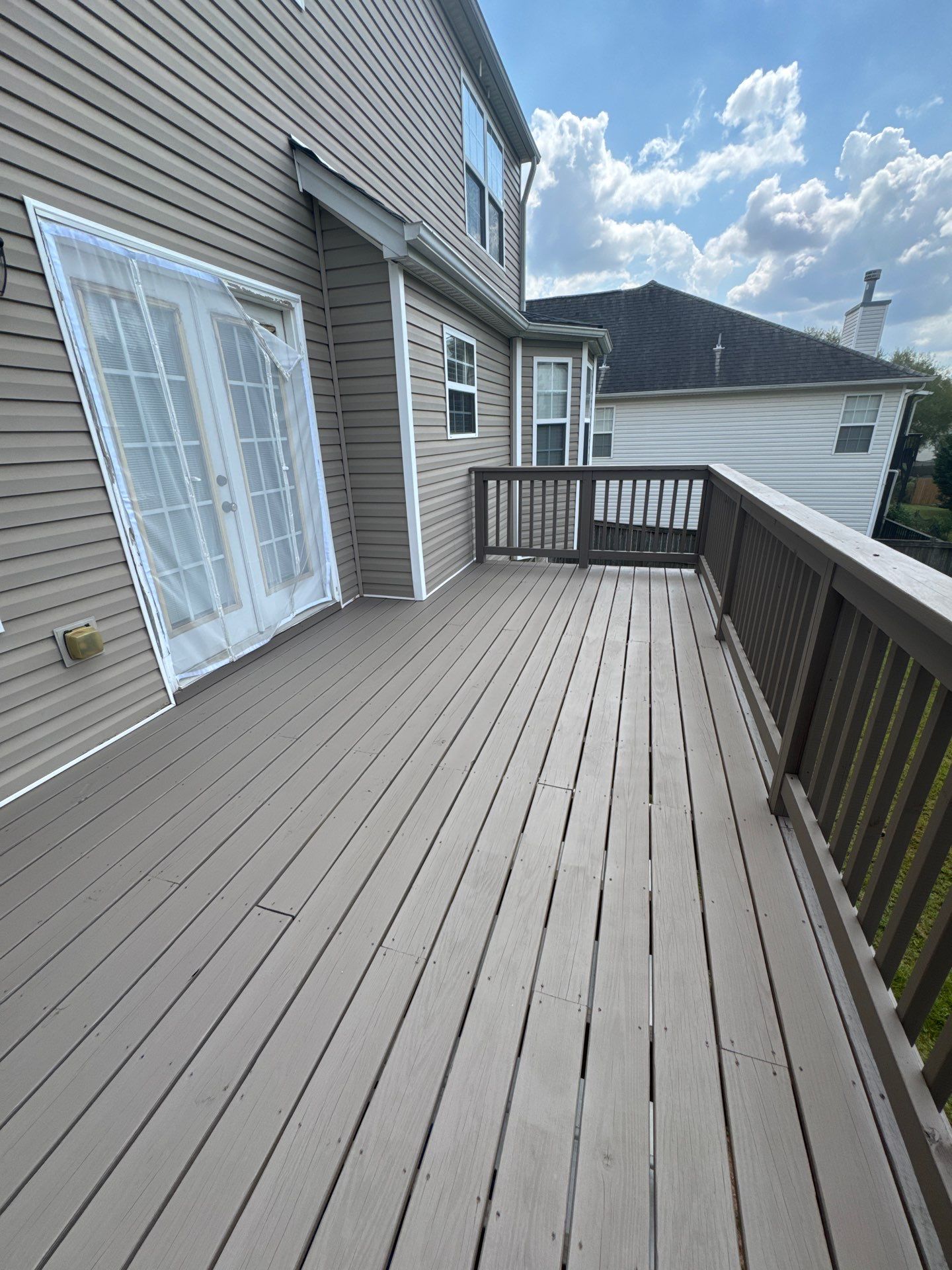 Multi-Level Deck Restoration and Solid Color Staining in Suwanee by Swift Home Renovations