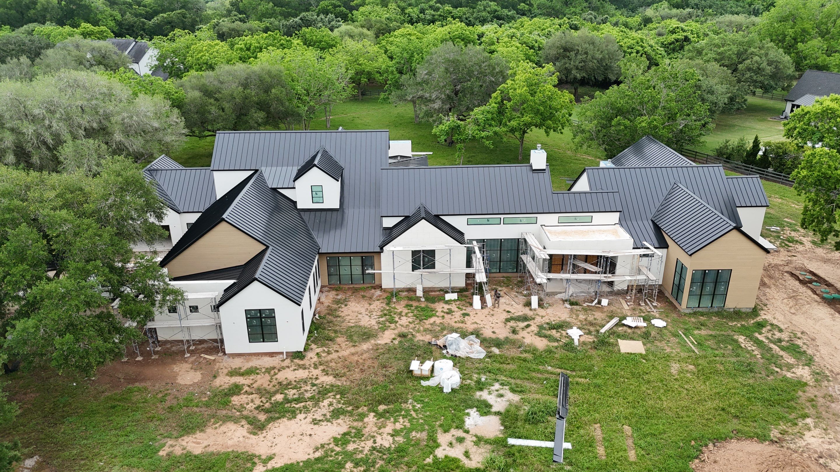 Matte Black Metal Roof by Level 7 Companies