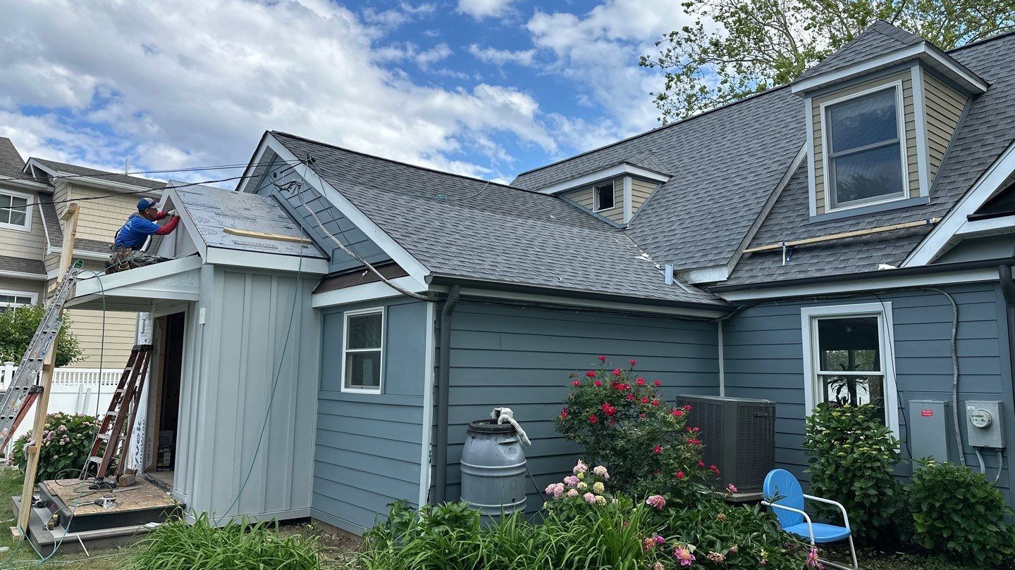 Siding Installation using JH Batten Smooth, JH Smooth Plank STMT, and JH Panel Smooth by ExteriorPros