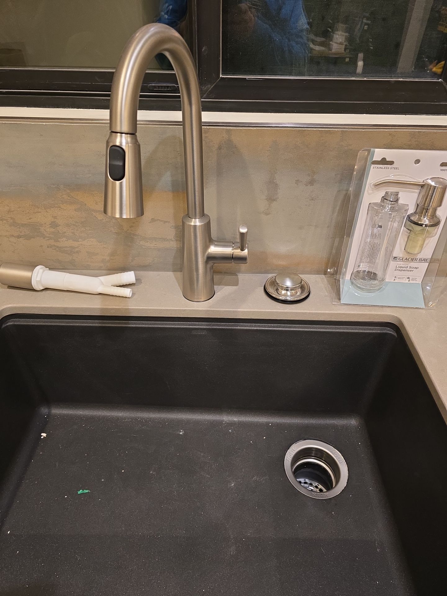 Installation of New Sink Flange, Piping, Fixtures, and Water Heater by Us Plumbing 