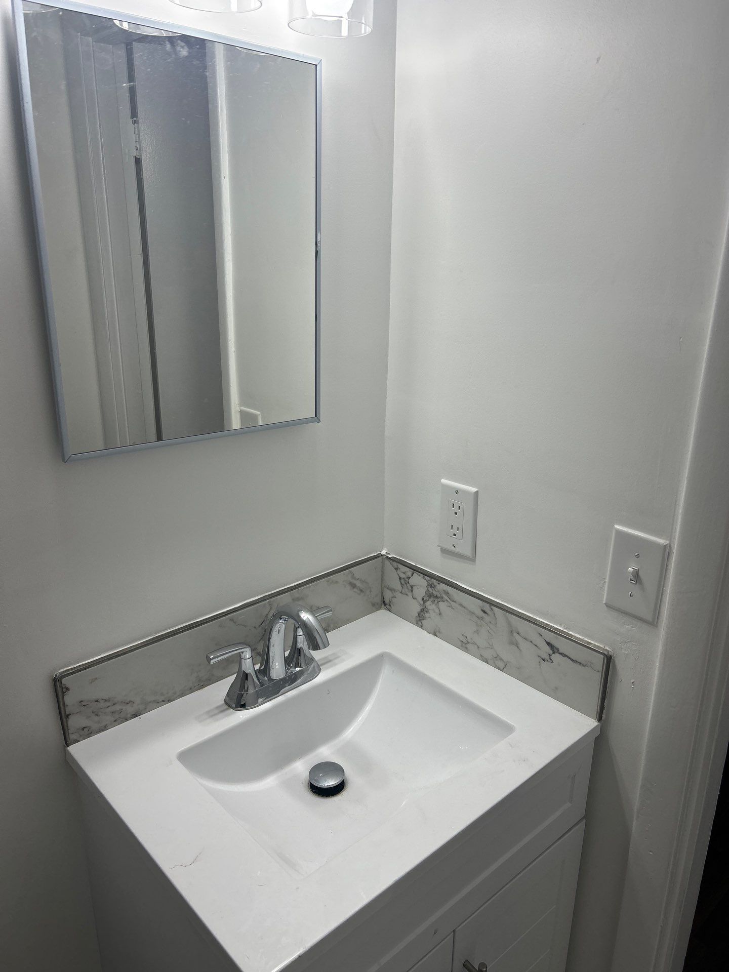 Dual Bathroom Makeover by urban green energy llc