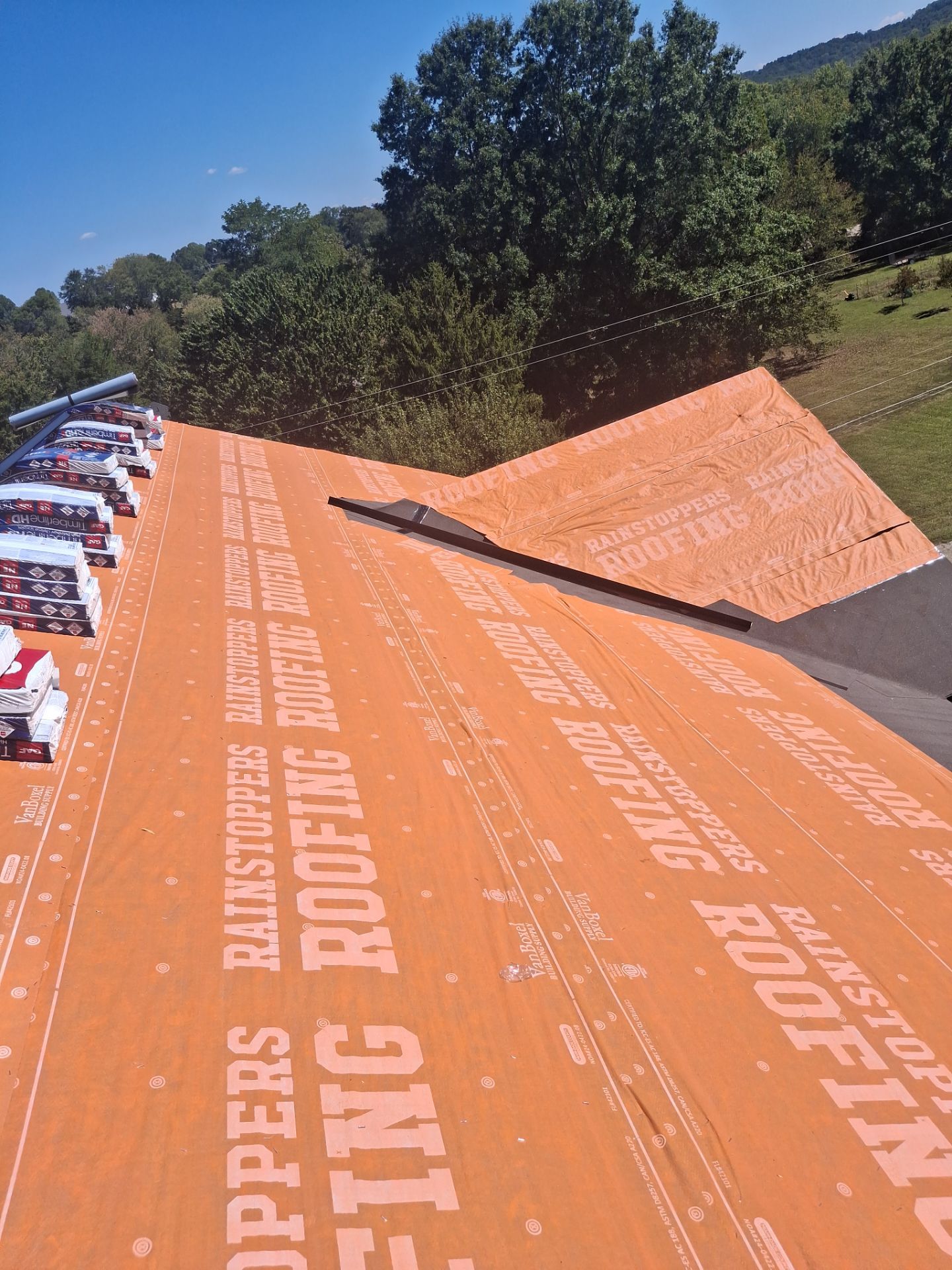 Residential Roofing Installation using GAF Timberline HDZ Charcoal by Rainstoppers Roofing