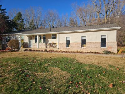 Weathered Wood Roof and Egress Window