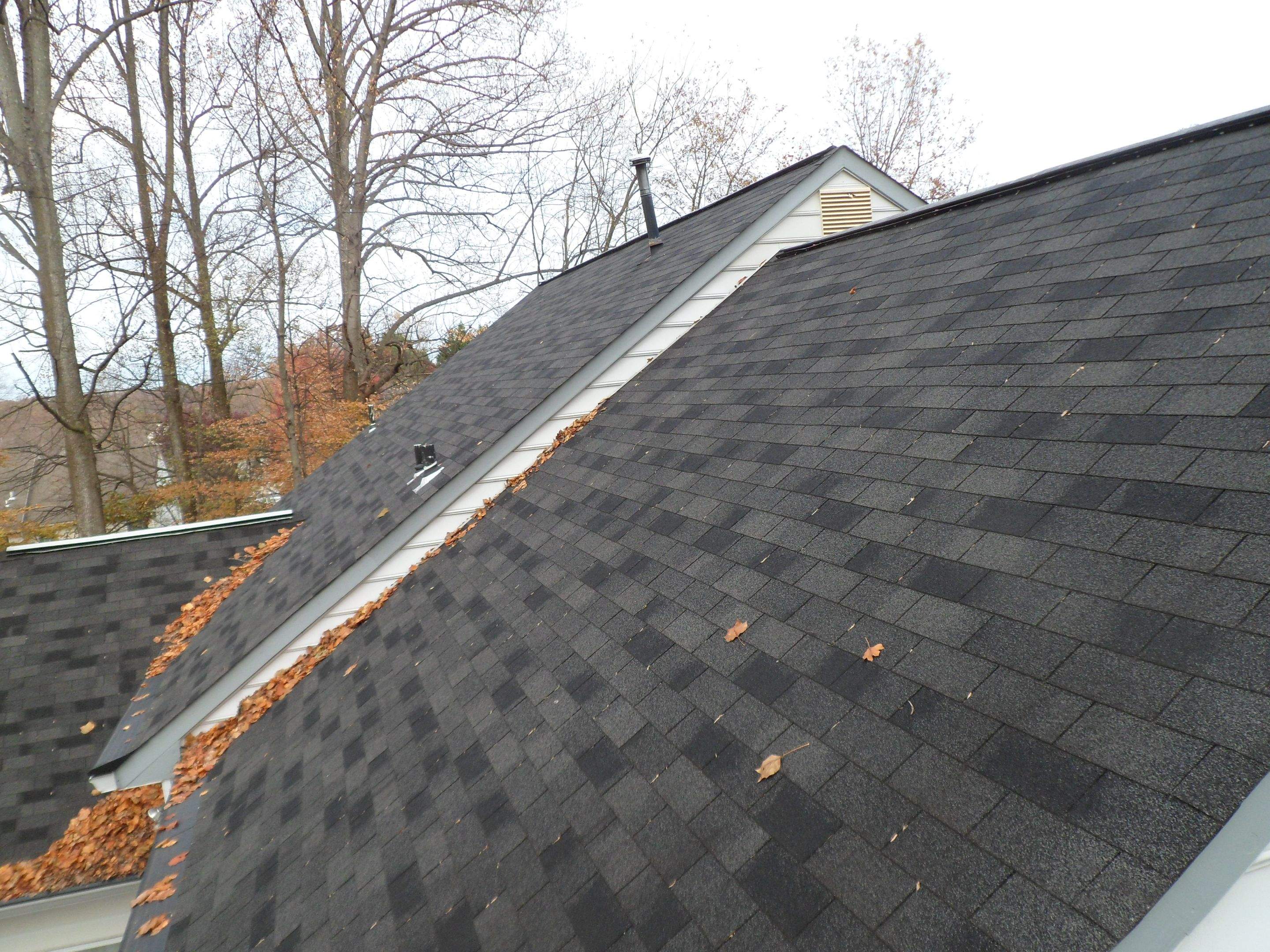 Residential Roofing Installation using Charcoal Black by Alpha Design Services