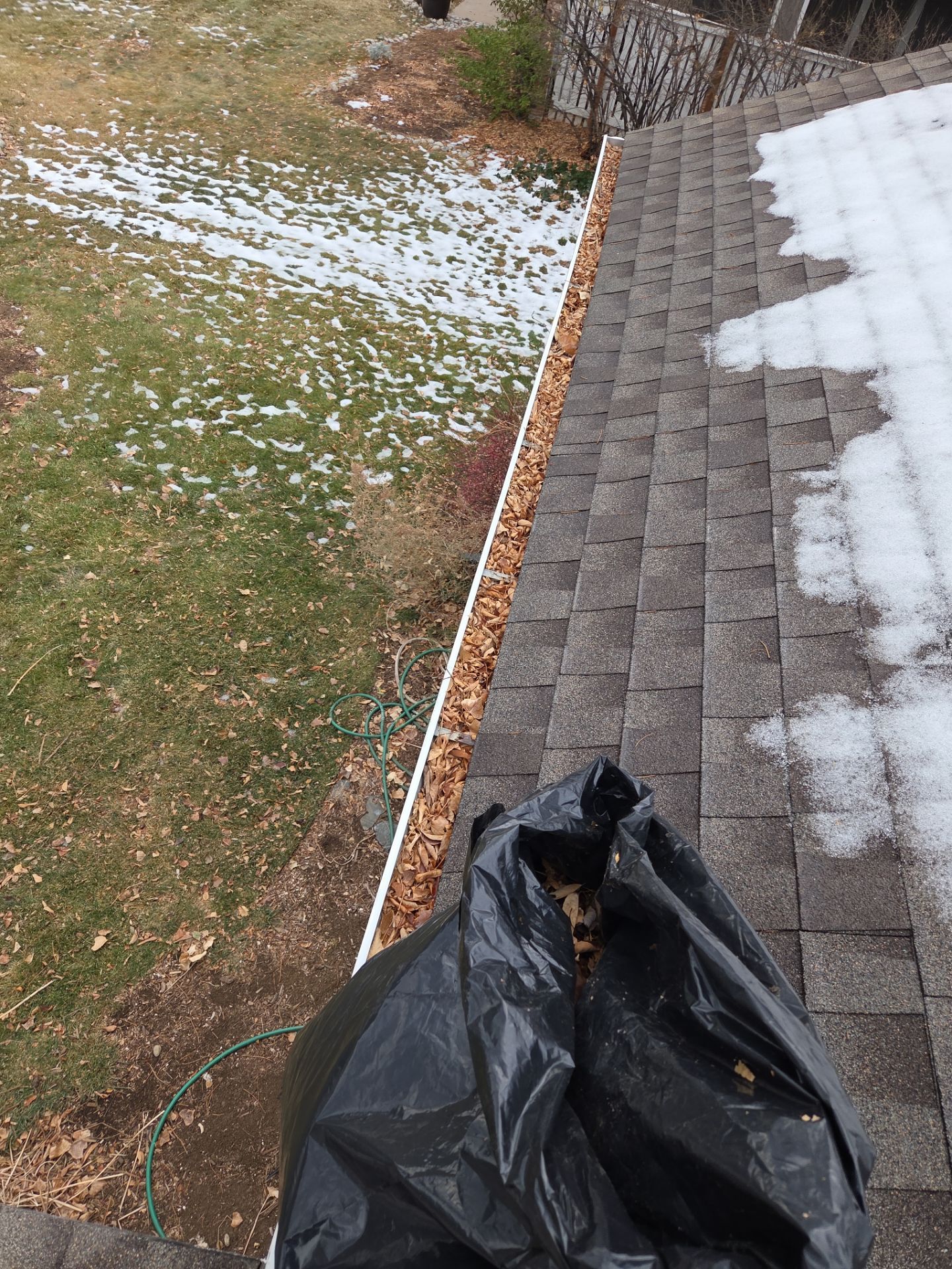 Gutter and Downspout Cleaning by RTP Roofing Company