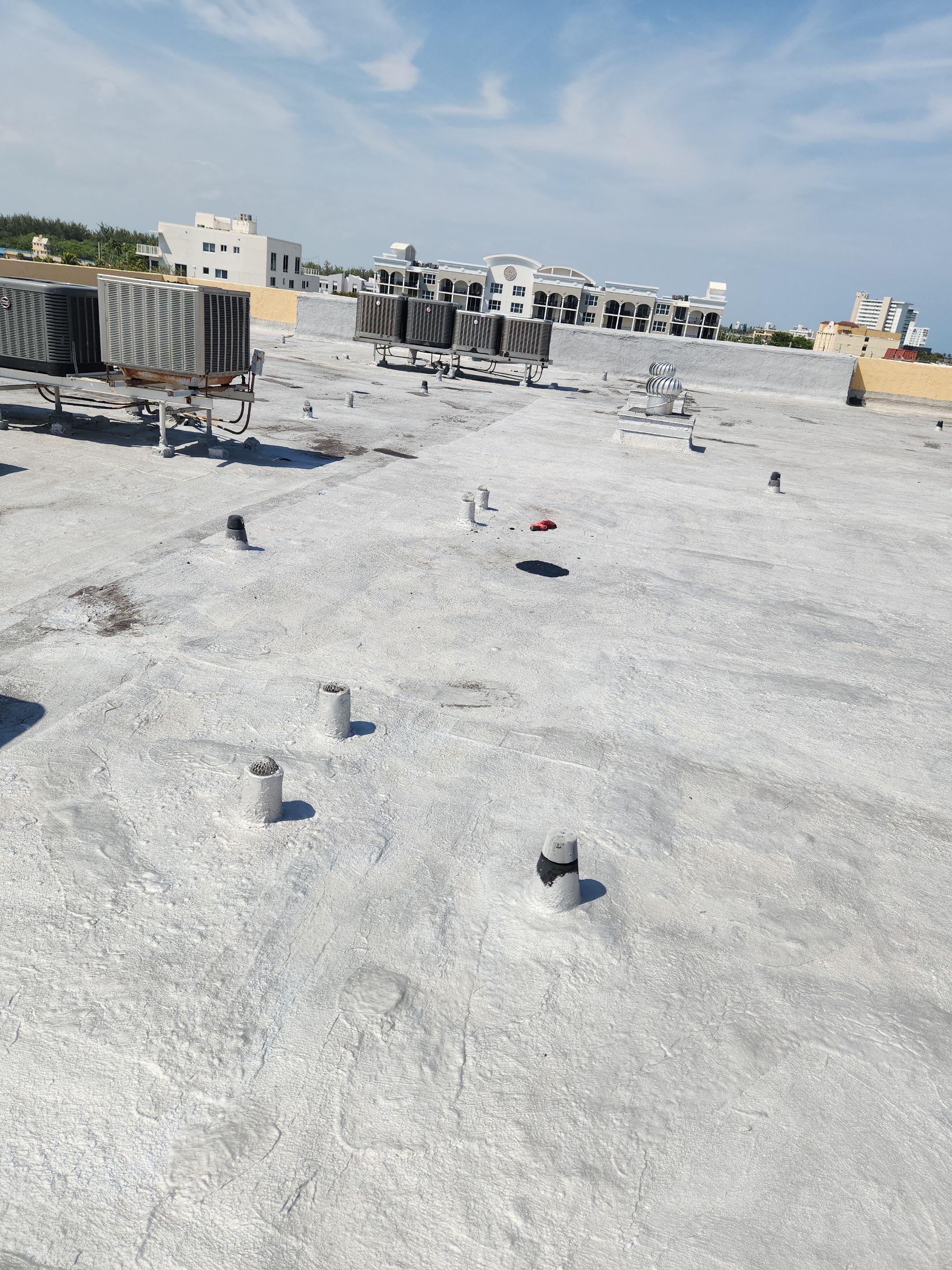 Commercial Flat Roof Repair and Silicone Coating in Deerfield Beach by Aastro Roofing