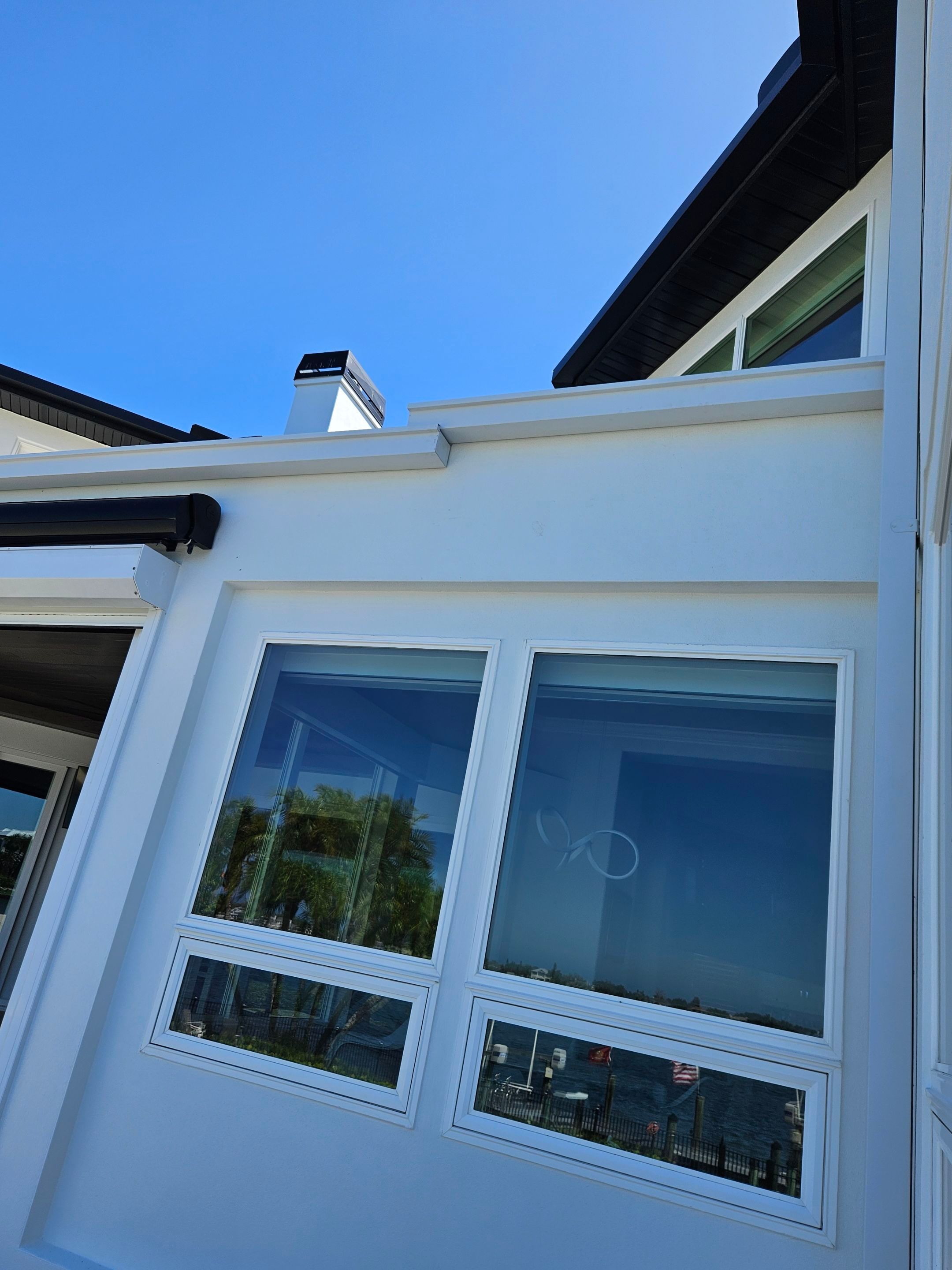 Soffit and Fascia Installation and black seamless gutters in Sarasota FL by Gutter Professors