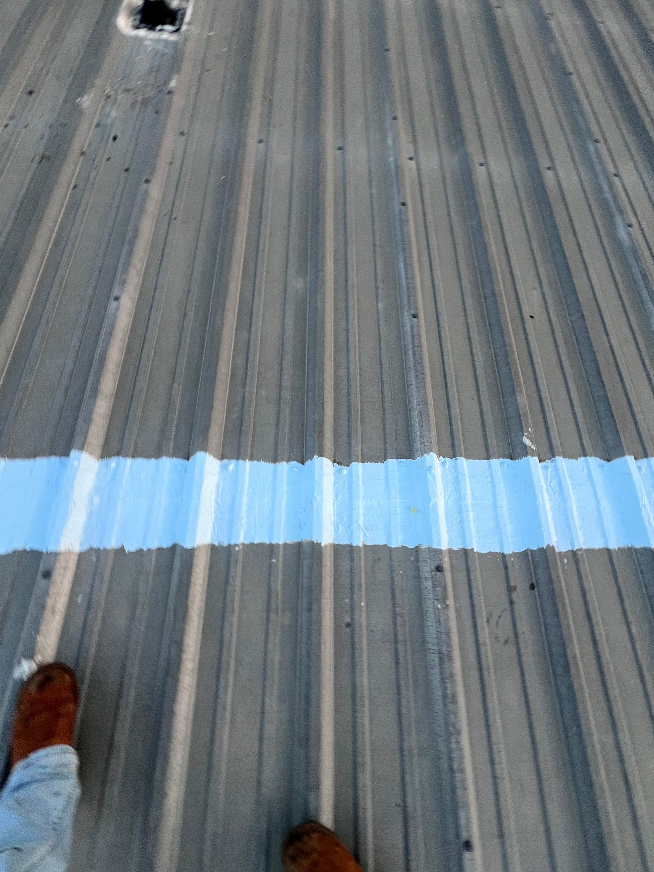 Hail Damage using Metal by Roof Repair Services LLC