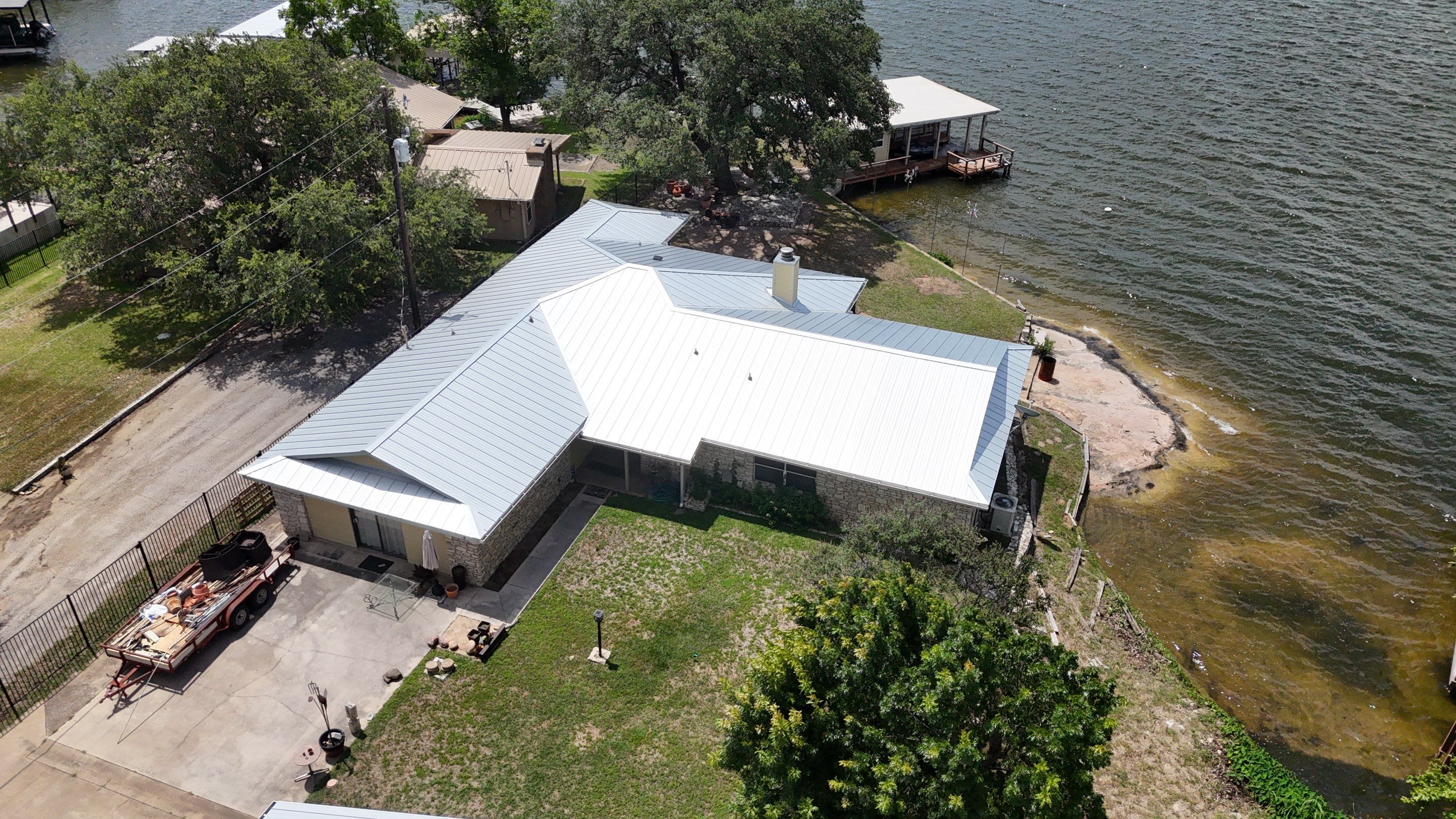 Residential Roof Replacement using 24 GA Snap-Loc - Galvalume by Action Exteriors Austin