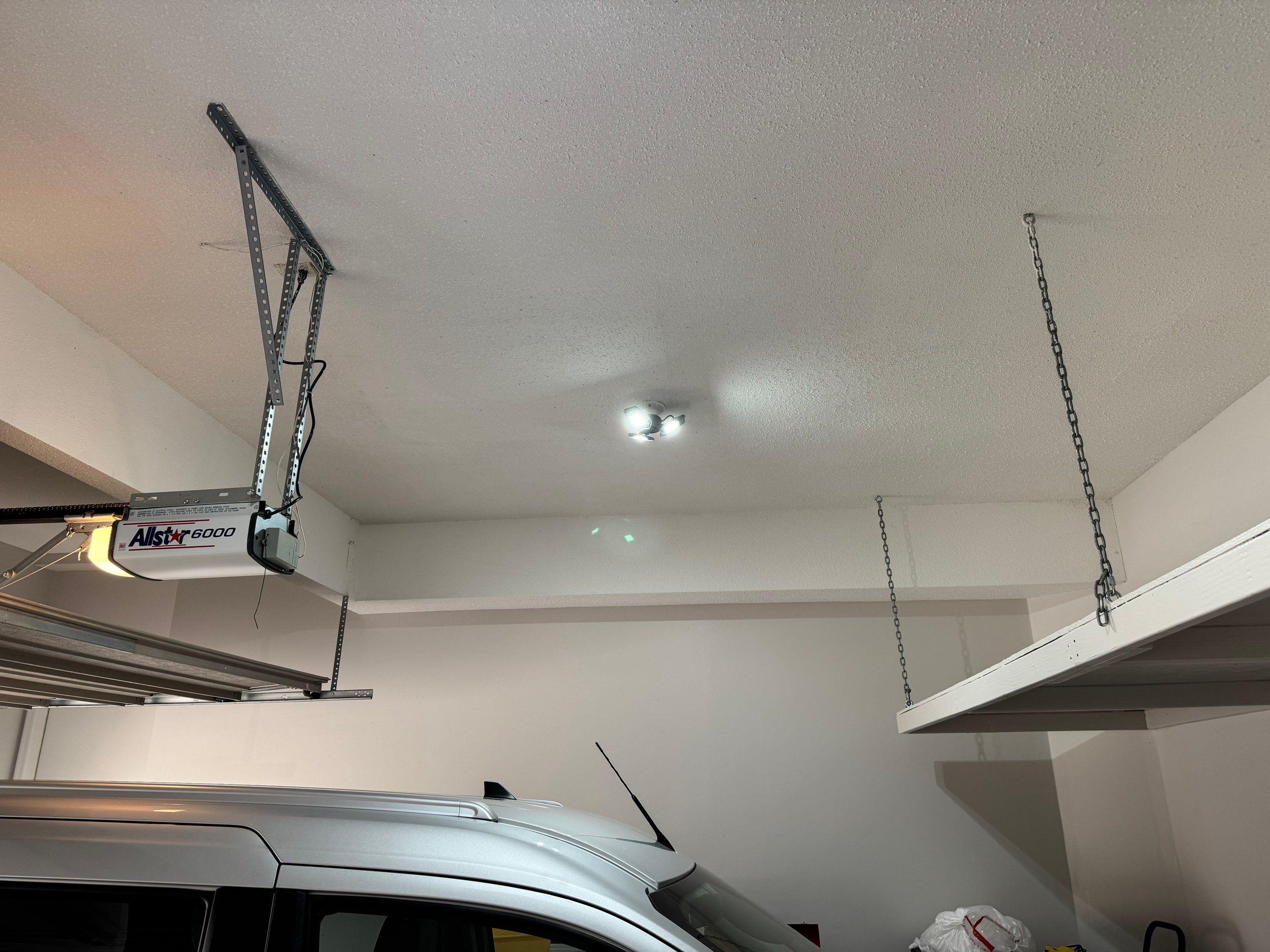 Custom Epoxy Flake Floor Coating and Ceiling Repair in Muskegon by Gordon Painting