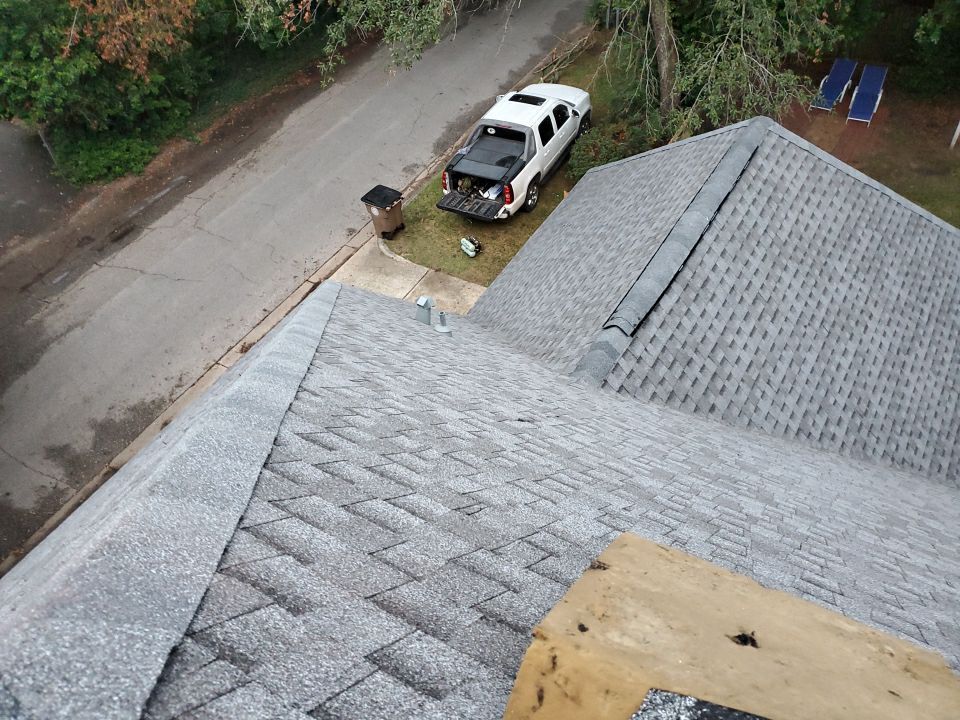Residential Roofing Installation using Roof Replacement by American Roofing & Construction LLC