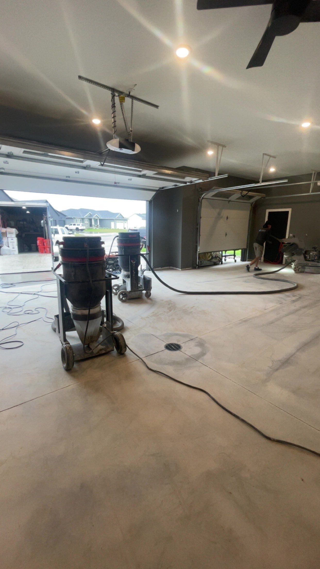 Custom Speckled Concrete Coating for Dell Rapids Garage by Select Painting, Coatings & Garage Cabinets