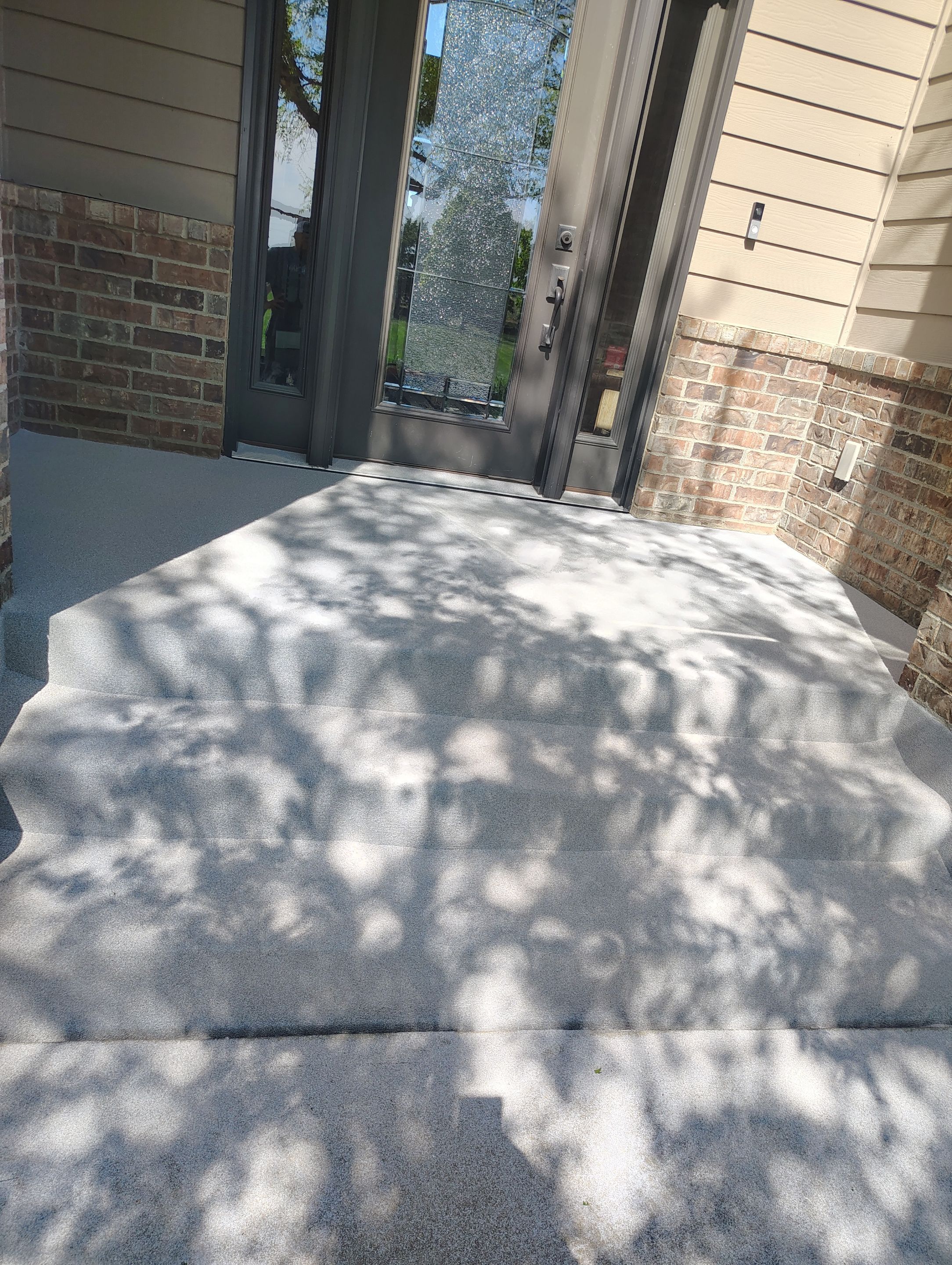 Front Porch Concrete Coating and Restoration in Harrisburg by Select Painting, Coatings & Garage Cabinets