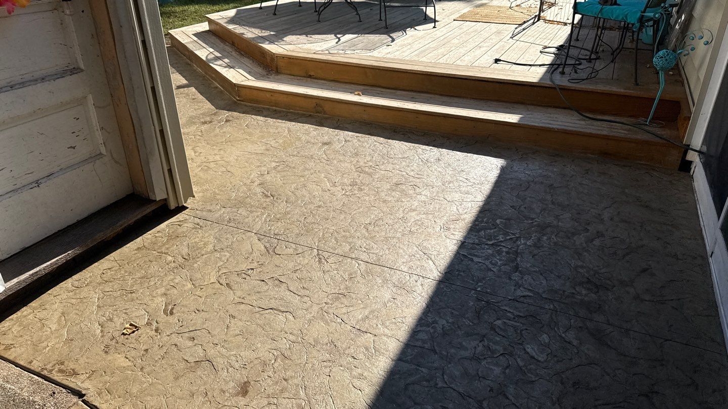 Oxford slate stamped patio  by NG Masonry & Construction LLC