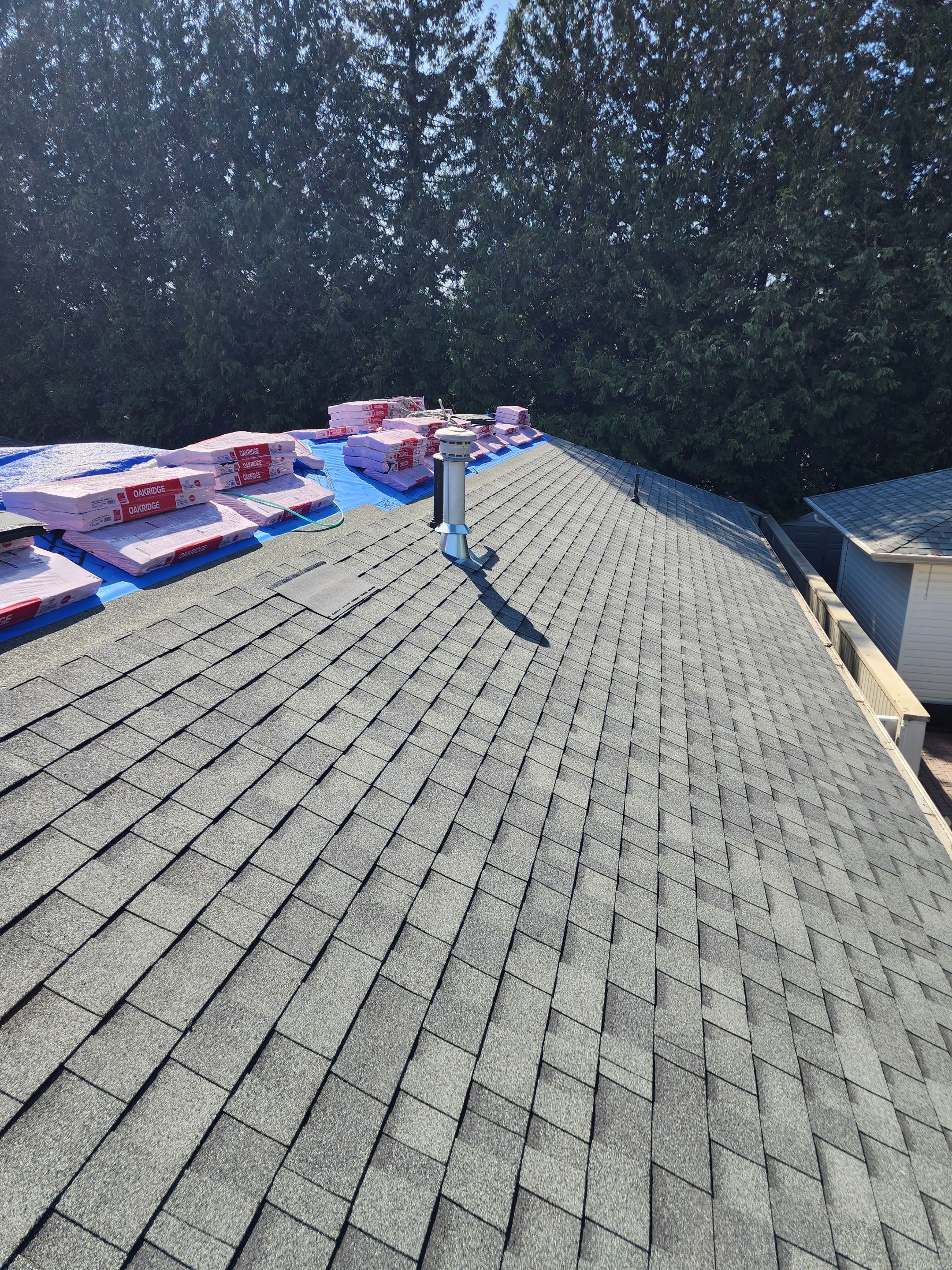 Residential ReRoofing Installation using OC Estate Gray Shingles by Top Notch Roofing Inc
