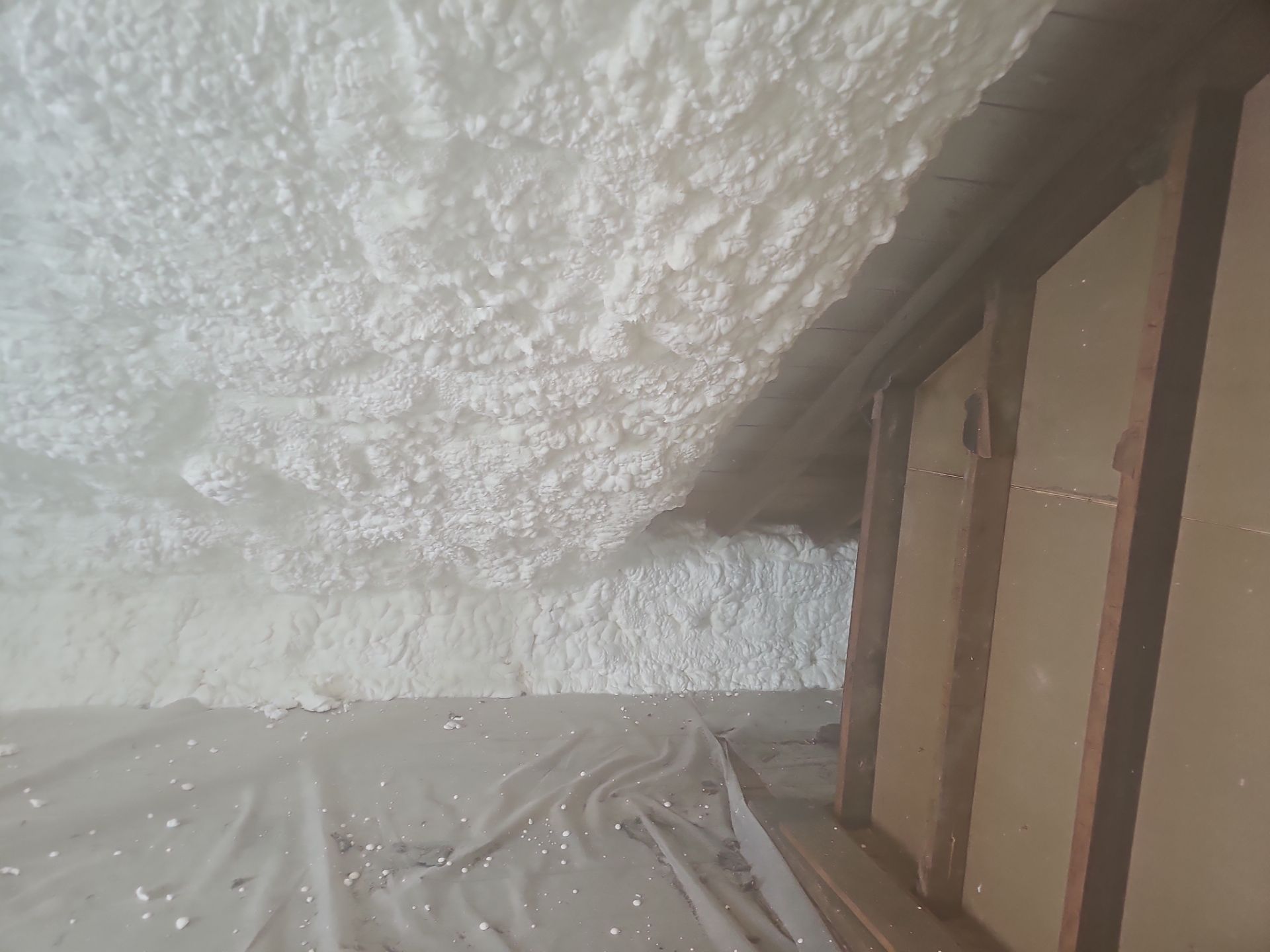 Attic Insulation using open cell spray foam by NYS Foam & Energy
