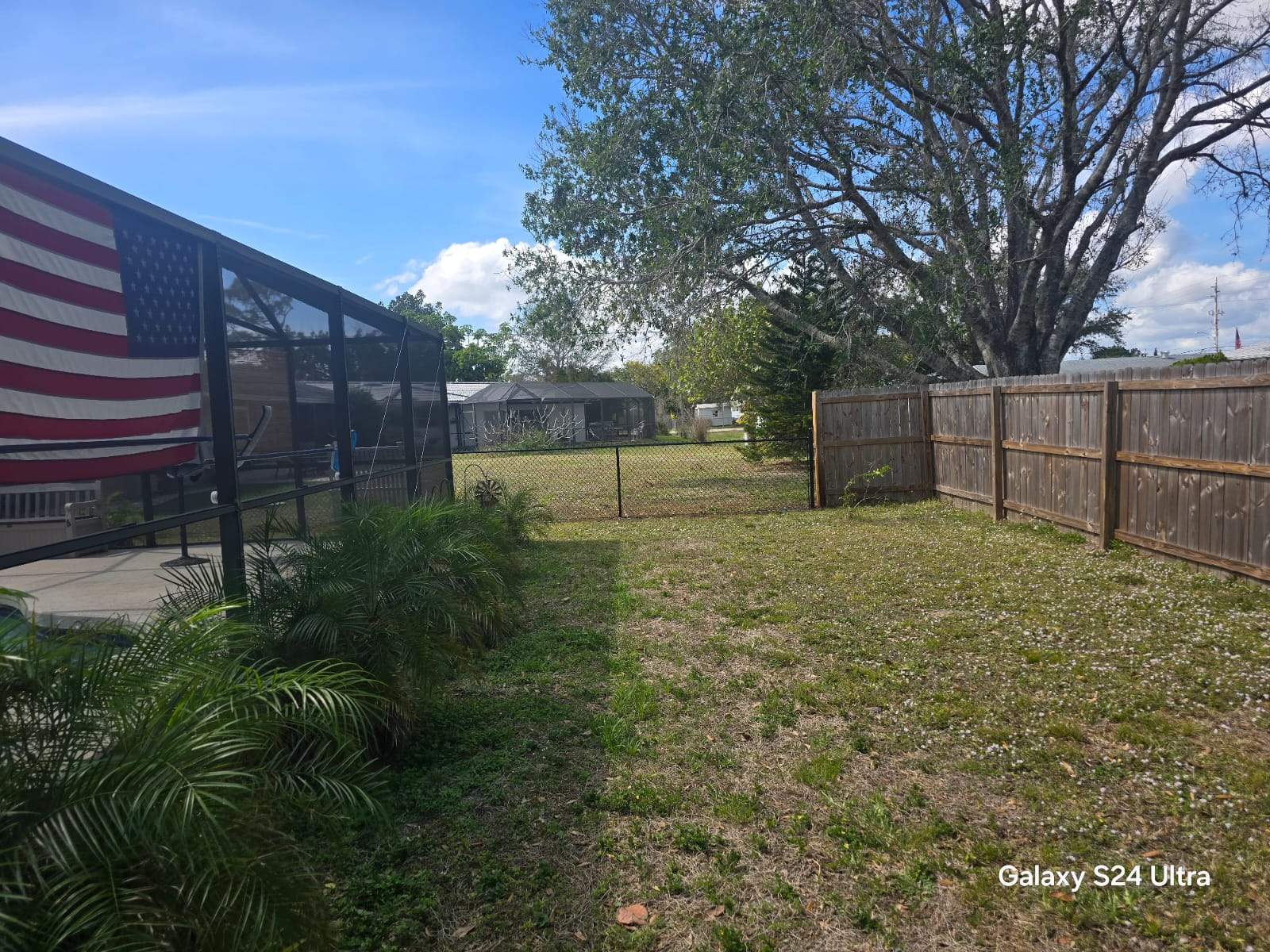 Black Chain Link Fence Installation for Port Charlotte Residence by True Fence LLC