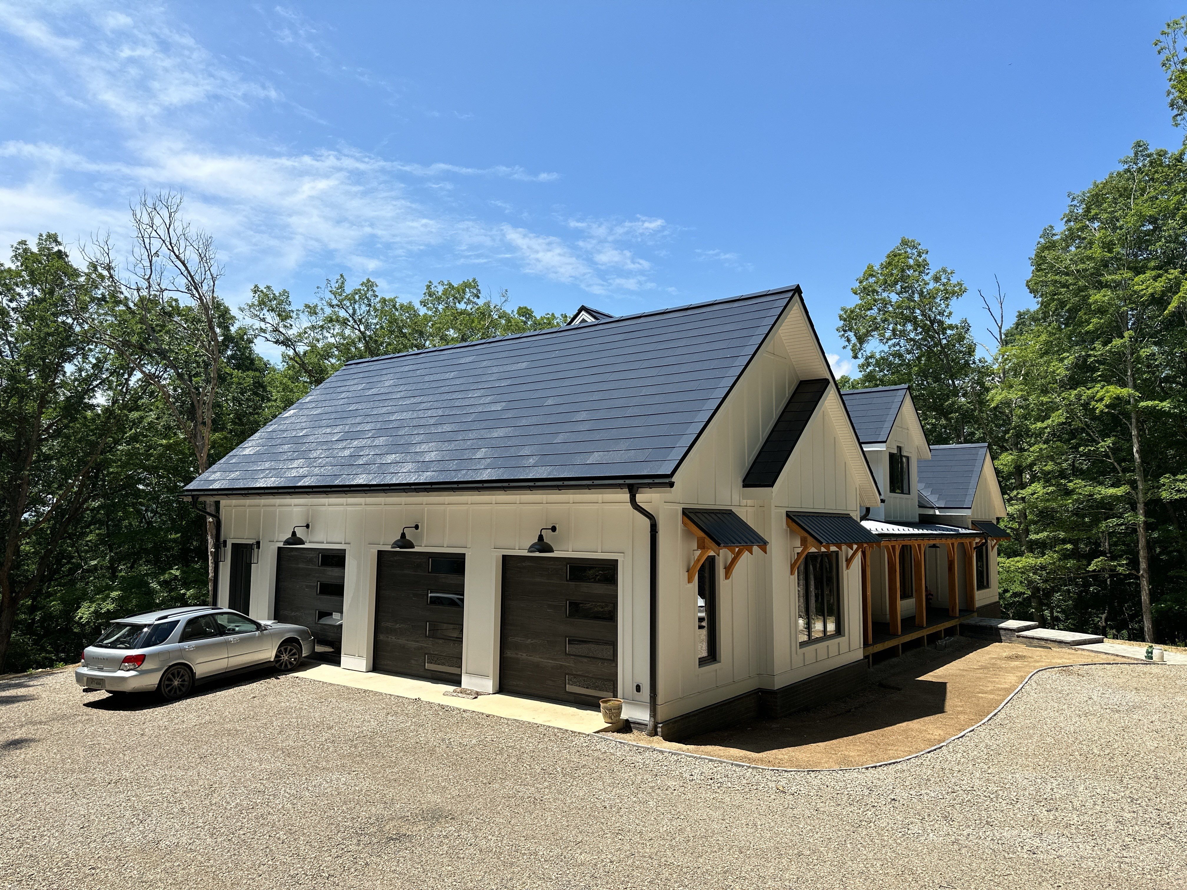 New Construction with Tesla Solar Roof + Powerwall by American Home Contractors