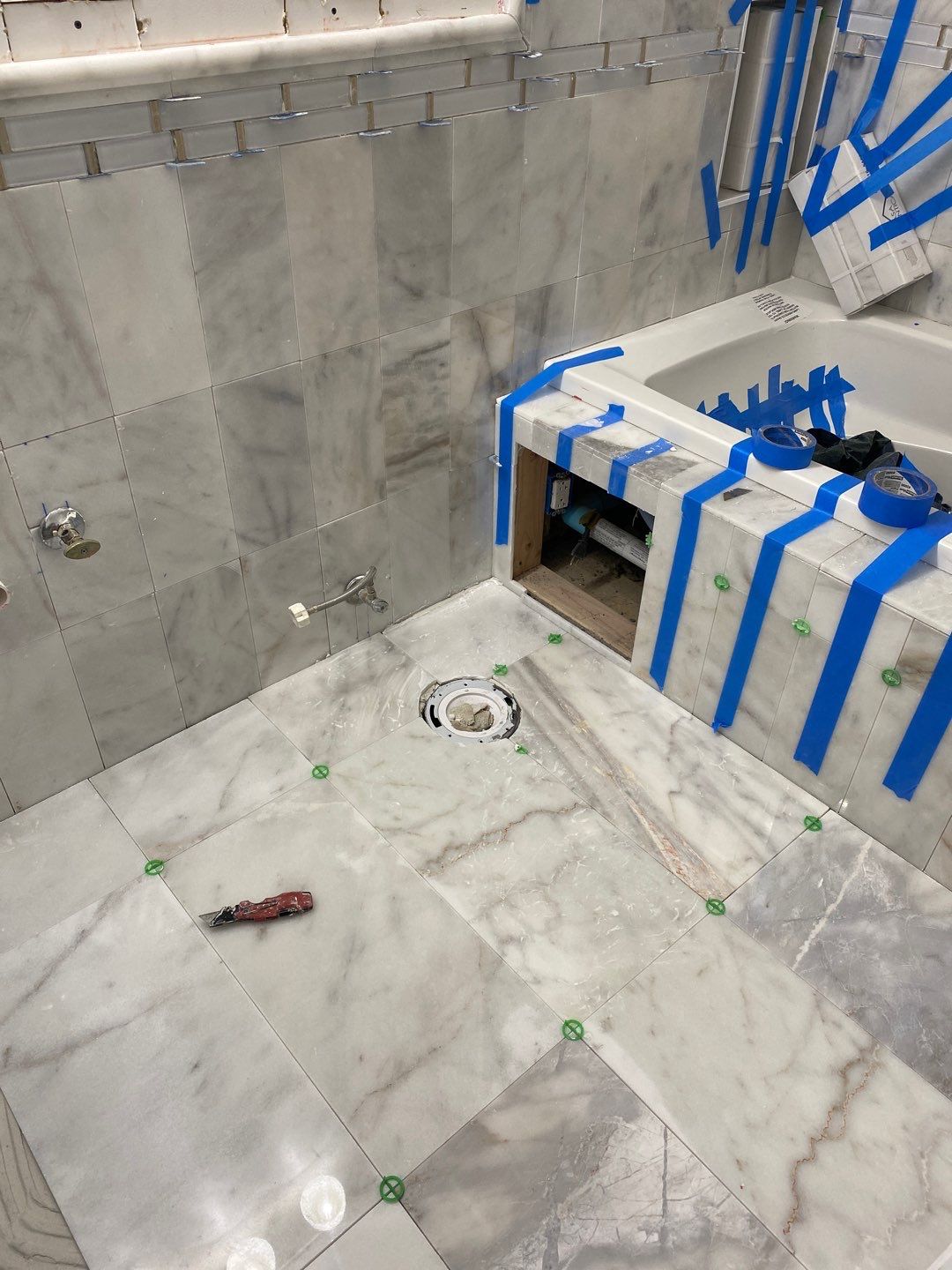 Bathroom Remodel using Two new bathroom design and new floors by Alpha Design Services