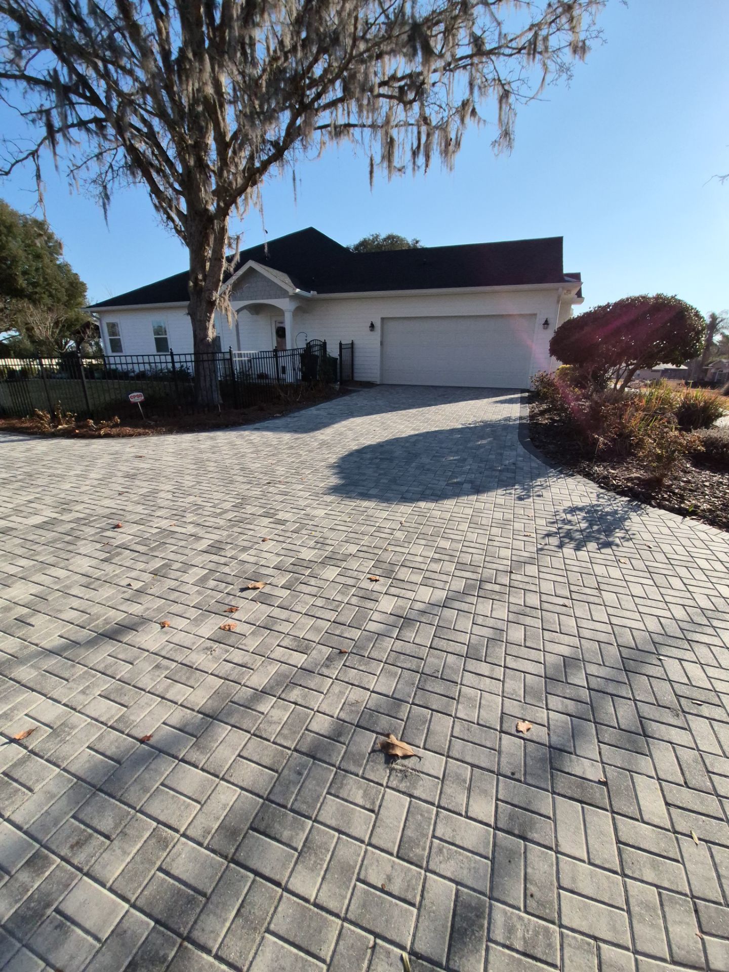 Paver Driveway and Backyard Patio Sealing in Ocala by Infinite Exteriors LLC