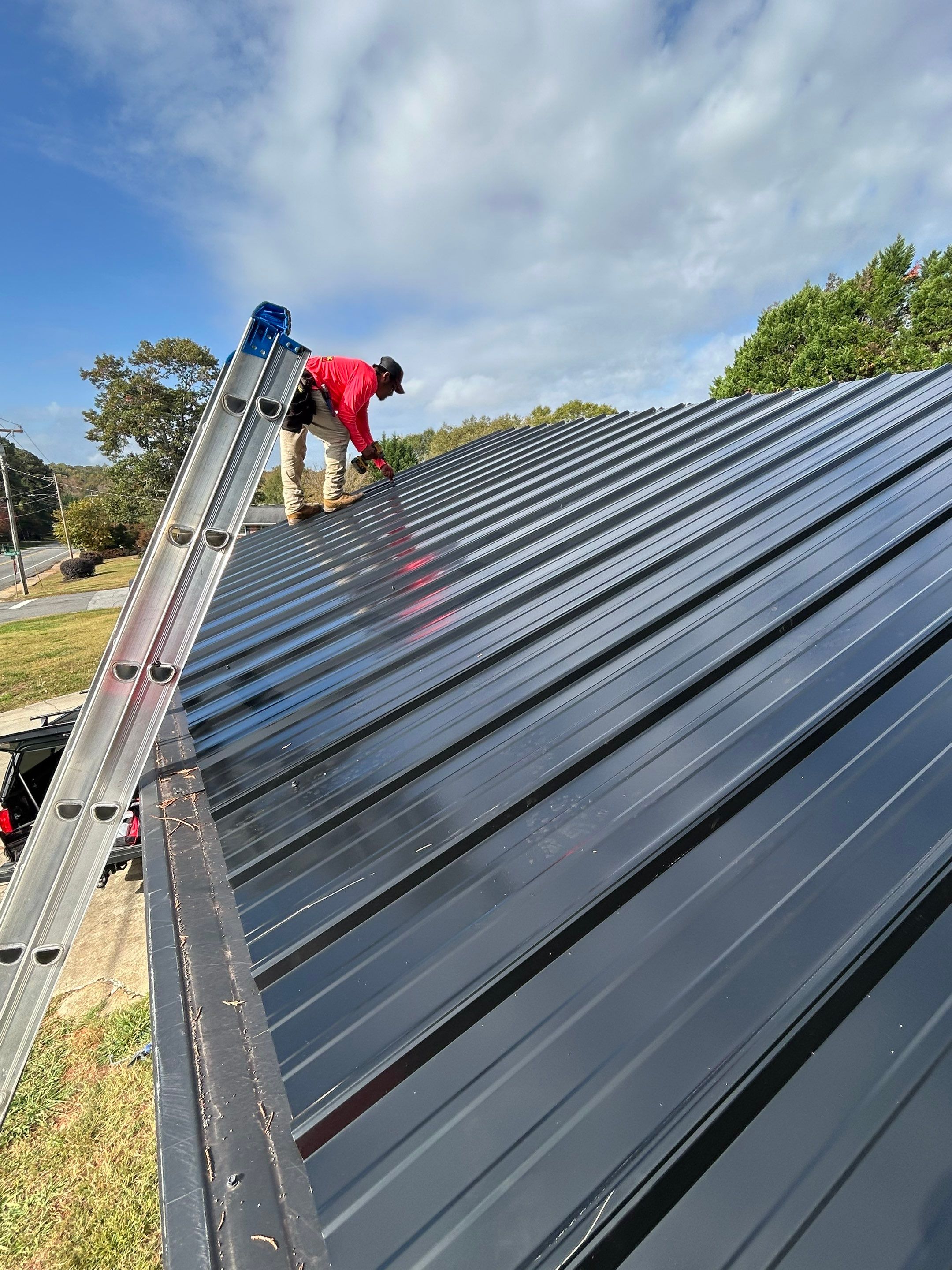 Storm Damage Repair and Garage Metal Roof Install  by Roofsters