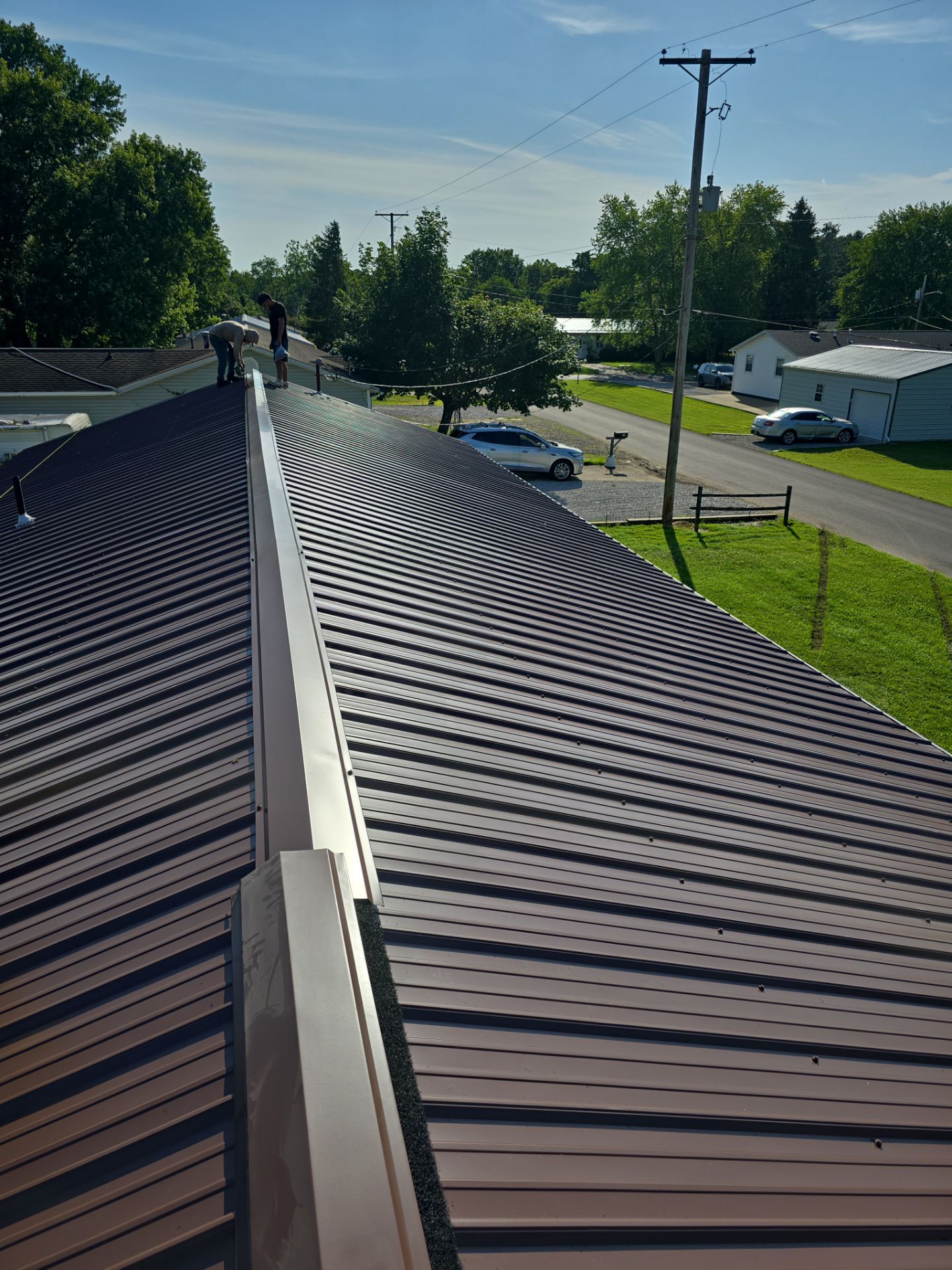 Residential Roofing Installation using Metal by Rainstoppers Roofing