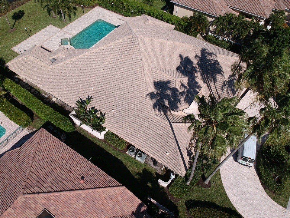 Residential Roofing Installation using 1" Nail strip metal roof by BLUES BROTHERS CONSTRUCTION CORP