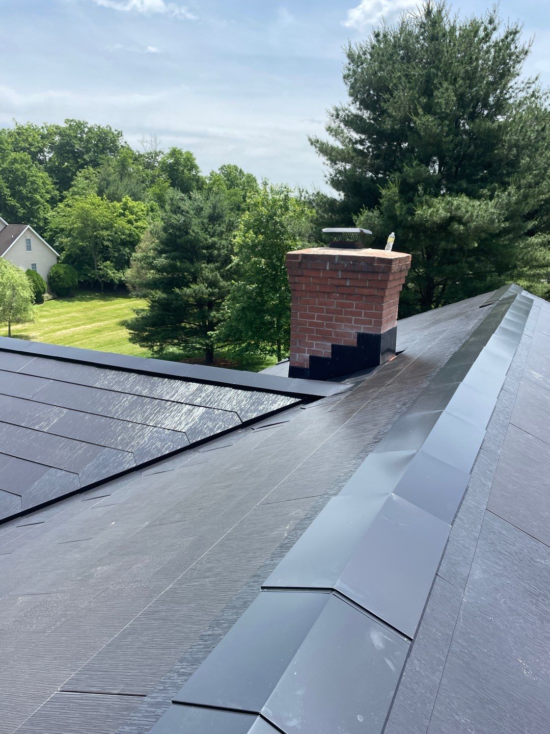 Tesla Solar Roof Installation by American Home Contractors