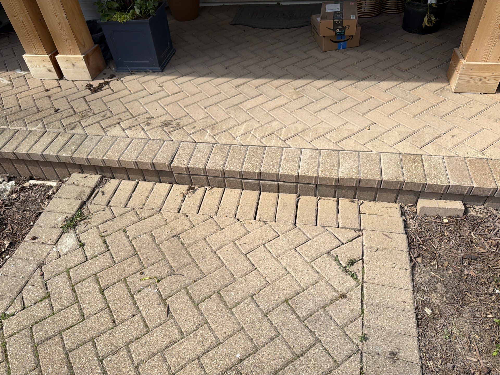 Brick paver repair, cleaning and sealing by Northern Power Washing LLC.