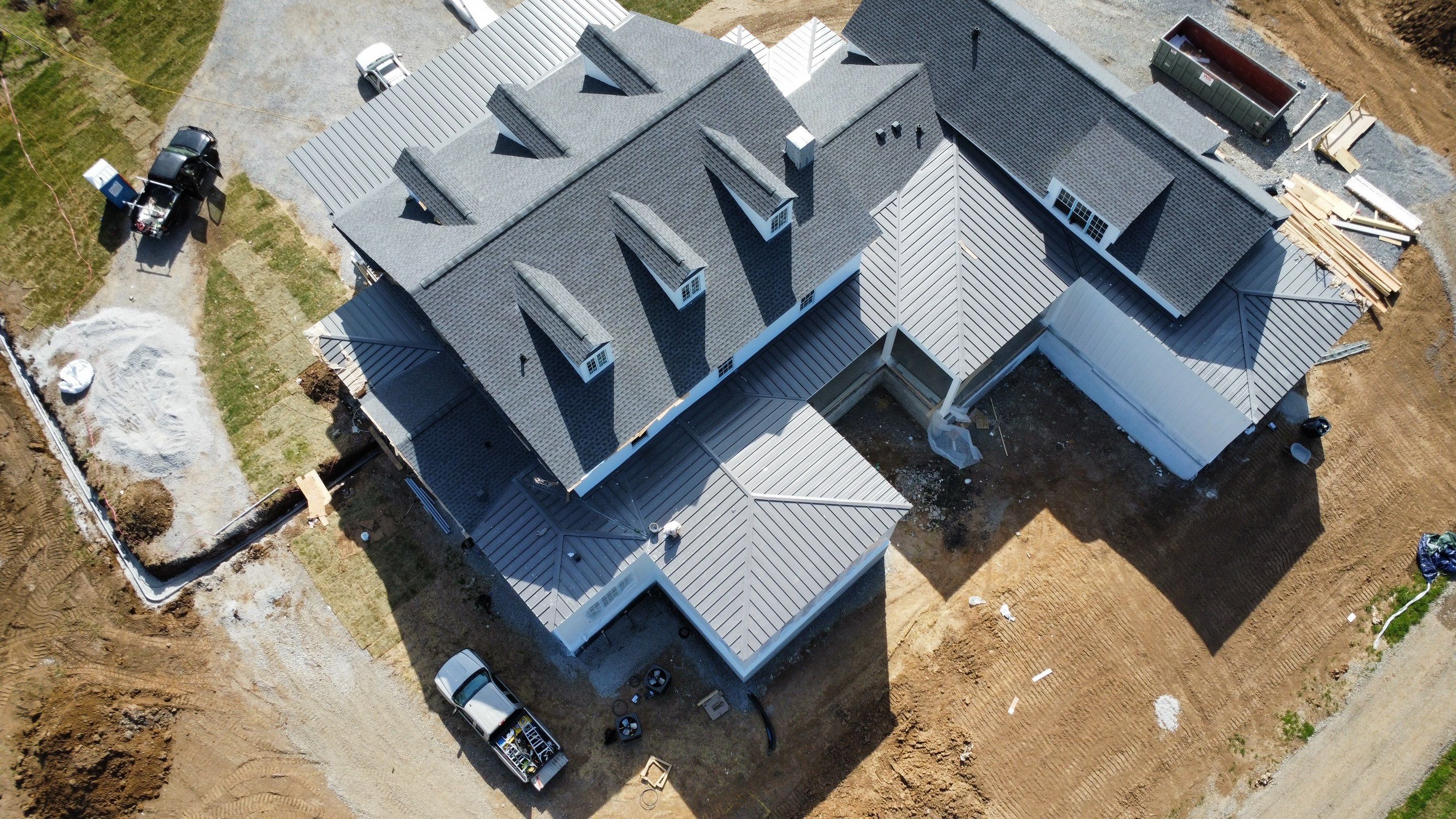 Residential Roof Install - Shingles and Standing Seam Metal by Undersun Roofing 