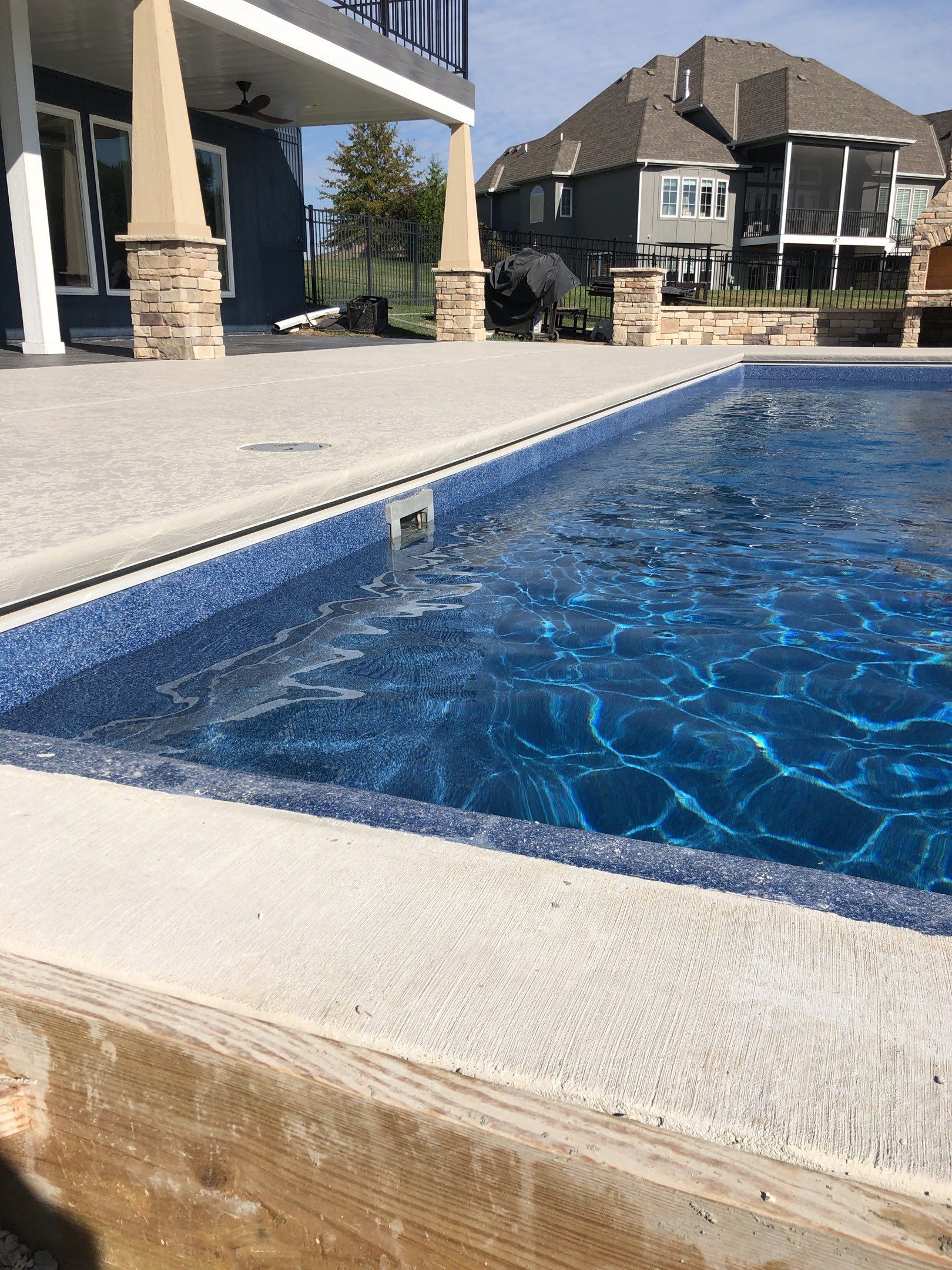 Parkville, MO -- Pool Deck Coating with Classic Texture (knockdown) finish by Big Red Decorative Concrete, LLC