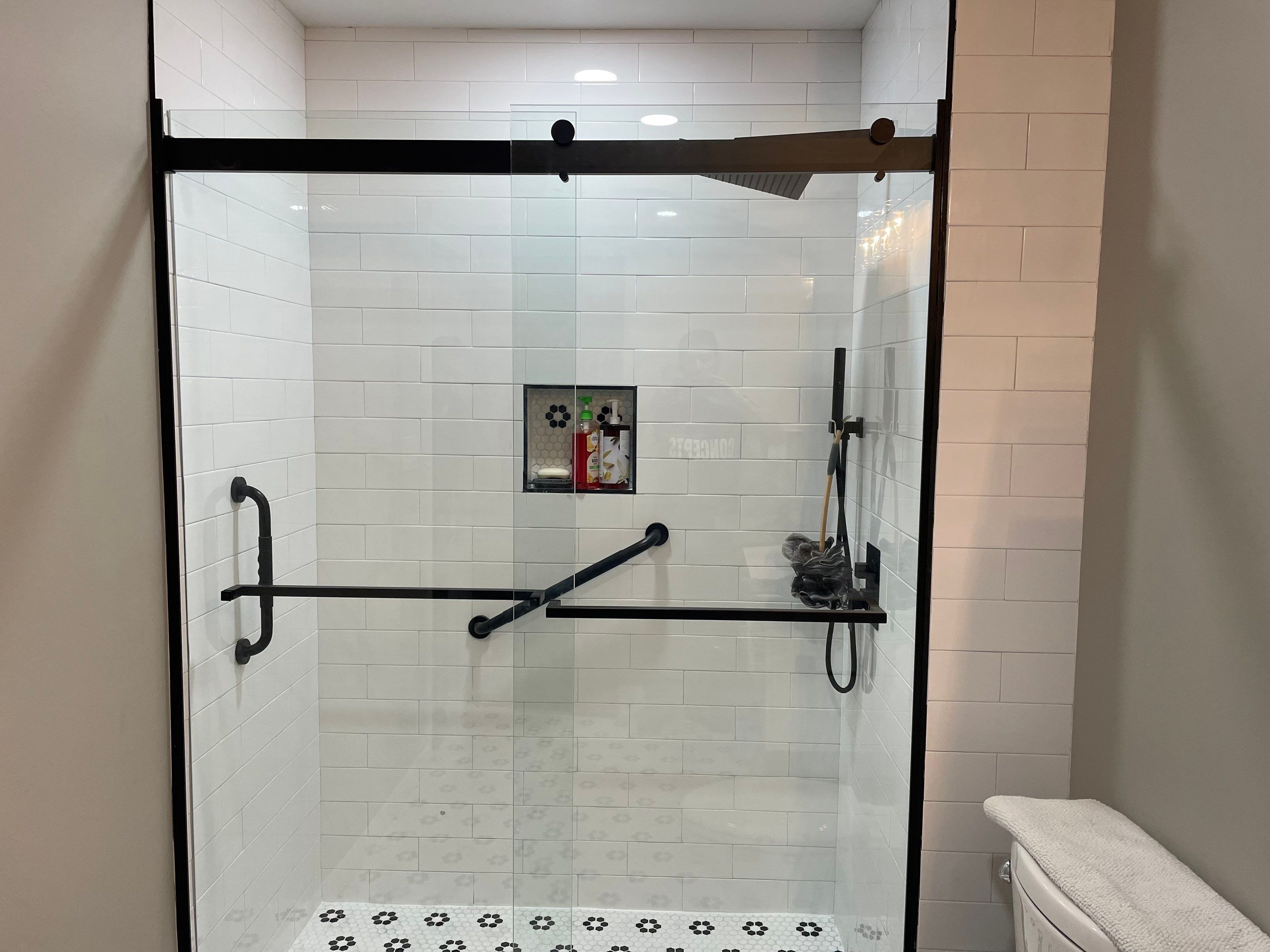 Bathroom Remodel using Tile by Home Concepts Construction