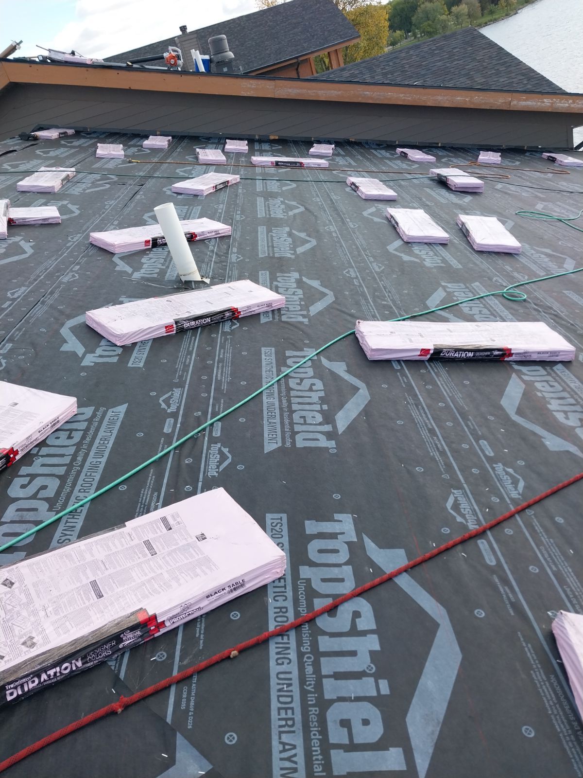 Commercial Roofing Installation using Shingles by Grell Roofing, LLC
